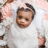 baby, infant, swaddled, basket, headband, pink, white, blanket, cushion, soft, cozy, portrait, cute, newborn, child, face, expression, curly_hair, indoors, photography