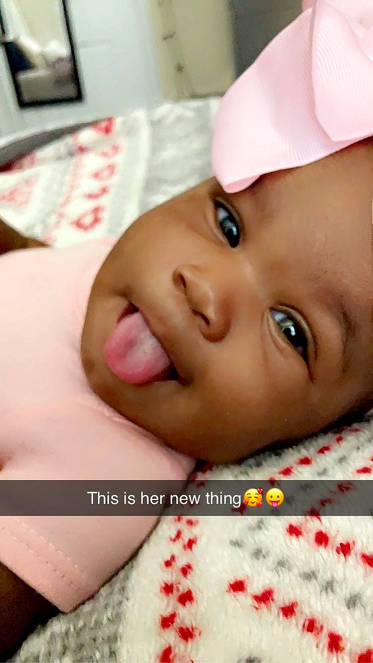 Tuuts is registered to the contest to win money with this photo: baby, cheek, child, chin, eye, eyebrow, eyelash, face, forehead, happy, head, headgear, headwear, iris, lip, mouth, nose, person, pink, skin