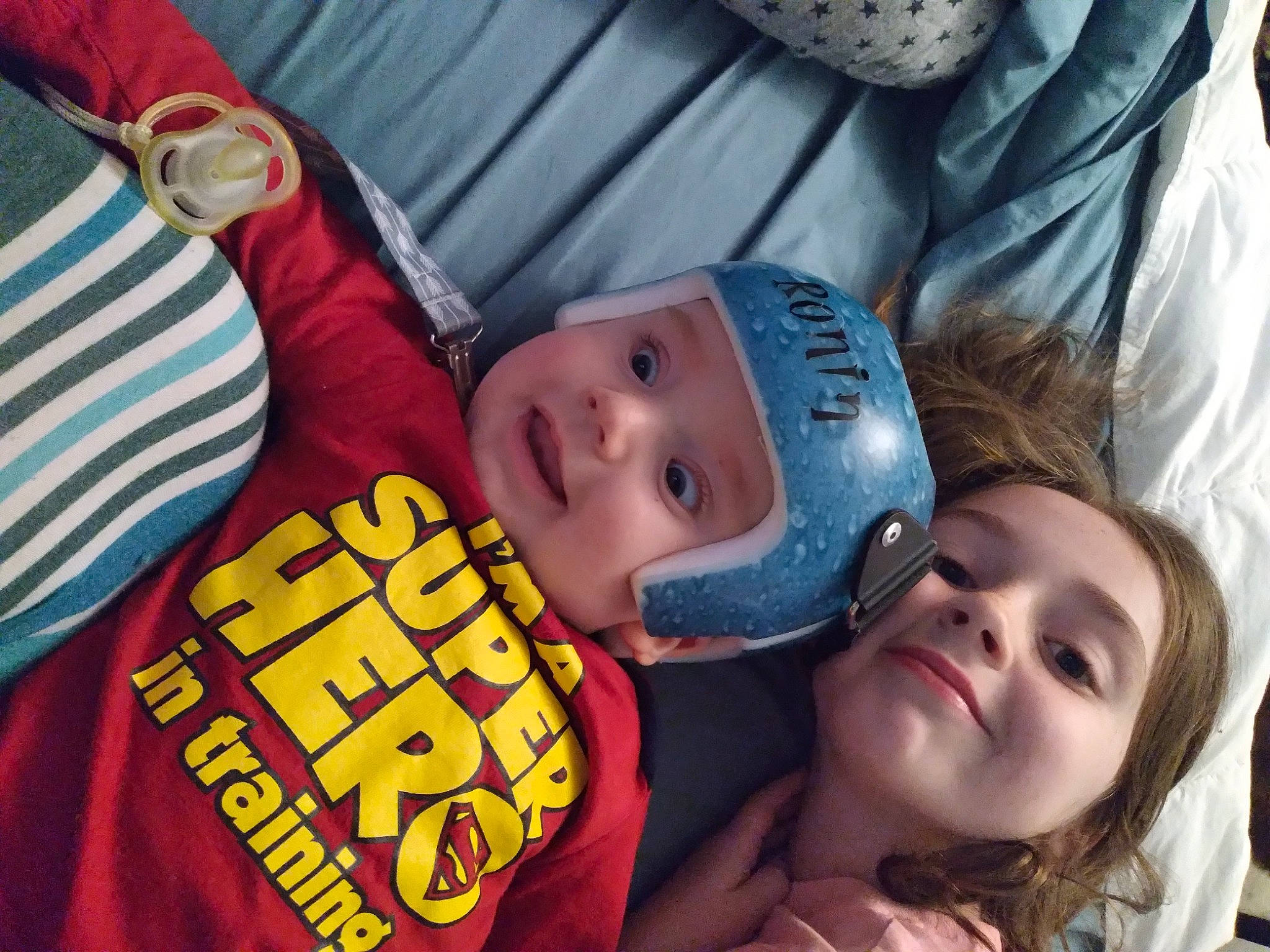 Ronin is registered to the contest to win money with this photo: baby, baseball_cap, cap, child, cool, event, facial_expression, fun, gesture, happy, hat, headwear, joy, leisure, mouth, person, recreation, smile, t_shirt, toddler