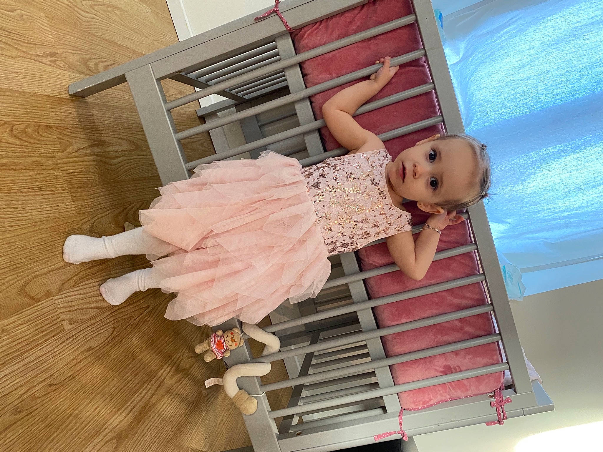 Layanna participe au concours pour gagner de l'argent avec cette photo : baby_toddler_clothing, child, cocktail_dress, day_dress, dress, fashion_design, hardwood, material_property, one_piece_garment, pattern, peach, person, pink, room, ruffle, sleeve, textile, thigh, toddler, waist