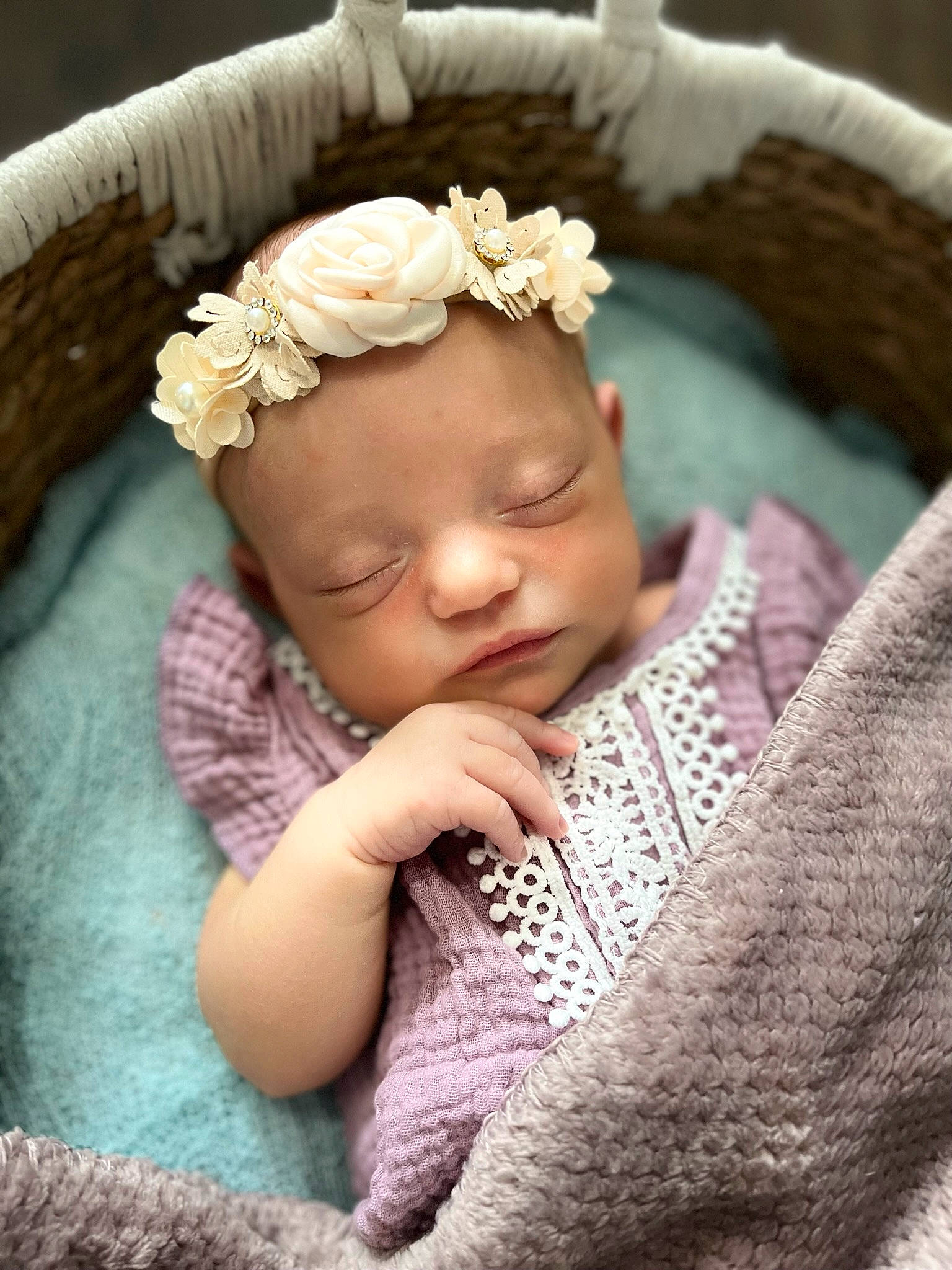 Annabelle is registered to the contest to win money with this photo: baby, baby_toddler_clothing, cheek, child, eye, fashion_accessory, flower, hand, happy, head, headband, headgear, headpiece, iris, magenta, pattern, person, petal, pink, sleeve