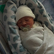 Enzo joined the competition — help win amazing prizes! newborn, baby, sleeping, blanket, pacifier, hat, bassinet, hospital, infant, cozy, swaddled, baby_nest, card, announcement, soft, pattern, face, cute, resting, child