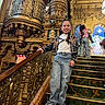 Ariel Rose joined the competition — help win amazing prizes! child, girl, stairs, handrail, smile, jeans, jacket, indoor, architecture, golden, decorative, carpet, railing, person, portrait, happy, playful, background, people, lighting