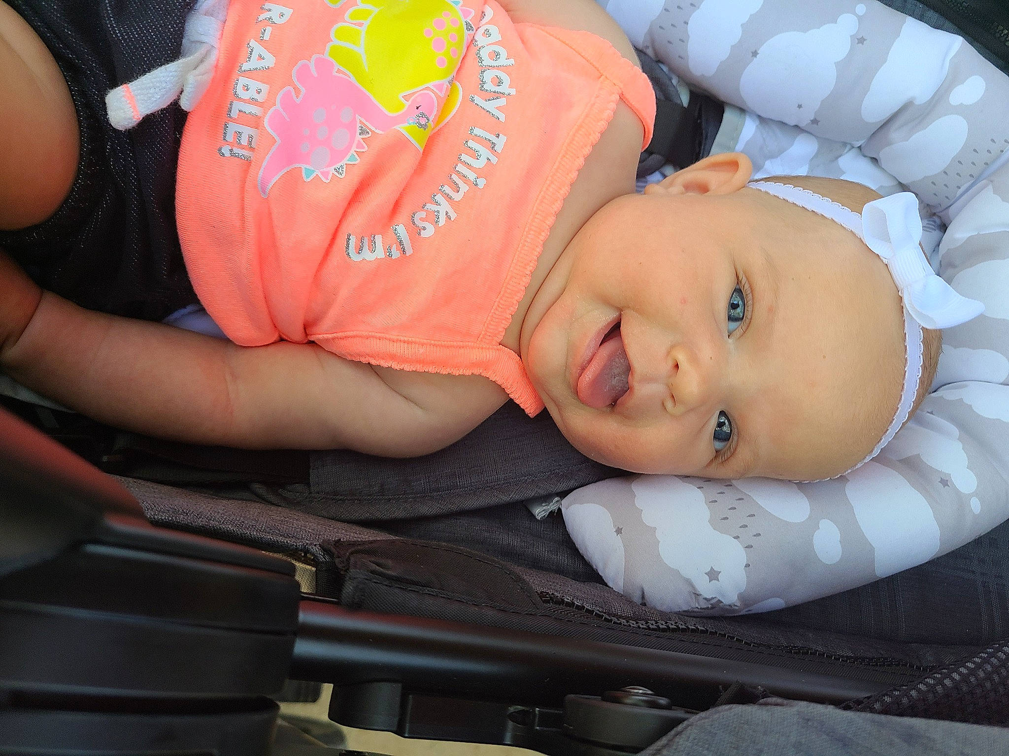 Keira joined the competition — help win amazing prizes! abdomen, baby, baby_carriage, baby_products, baby_toddler_clothing, cheek, child, comfort, elbow, fun, grass, hat, human_leg, mouth, person, plant, room, sitting, thigh, toddler