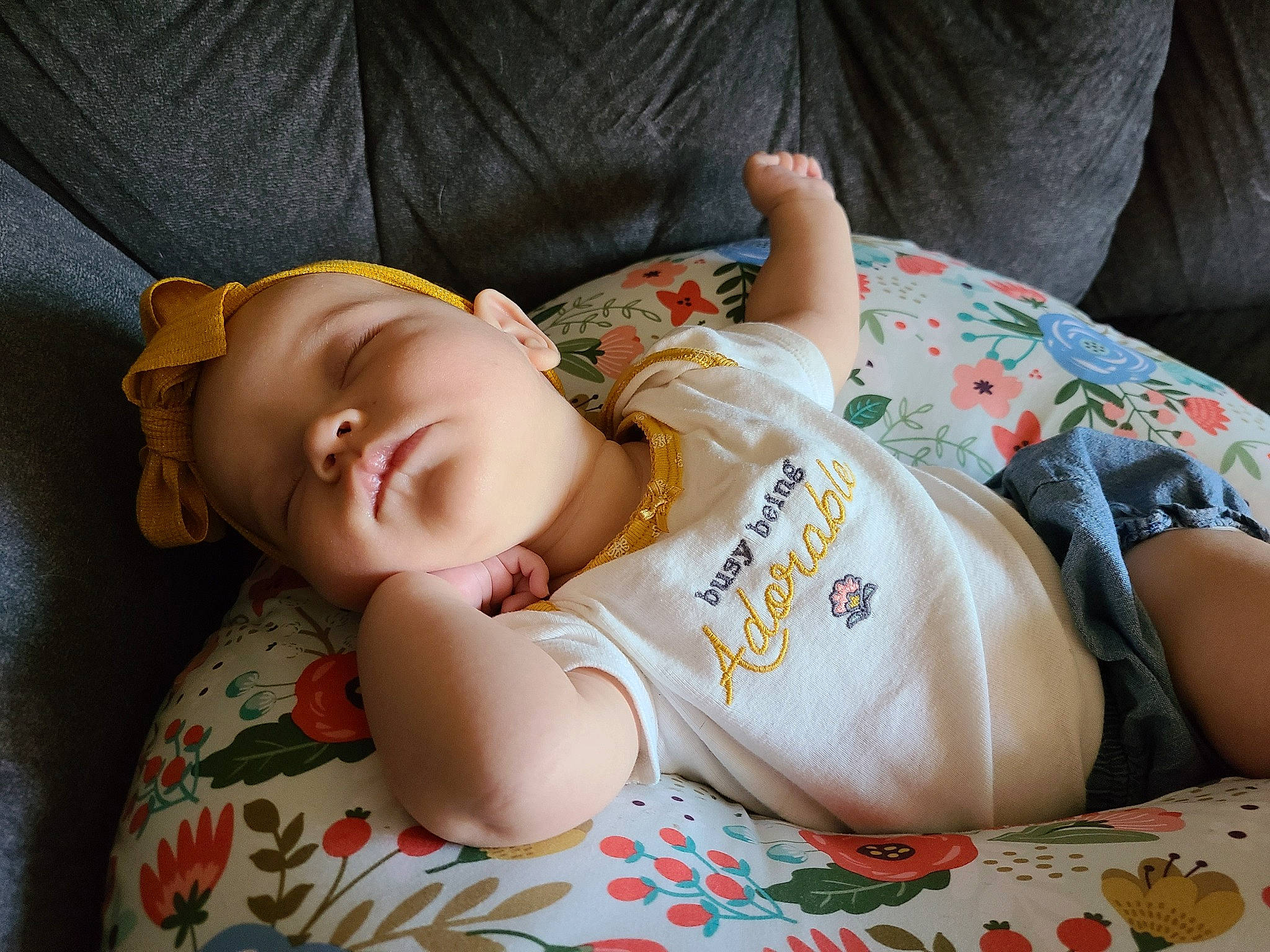 Keira is registered to the contest to win money with this photo: abdomen, baby, baby_products, baby_sleeping, baby_toddler_clothing, bedtime, cheek, child, comfort, eye, eyelash, head, linens, mammal, person, sitting, skin, sleeve, textile, thigh
