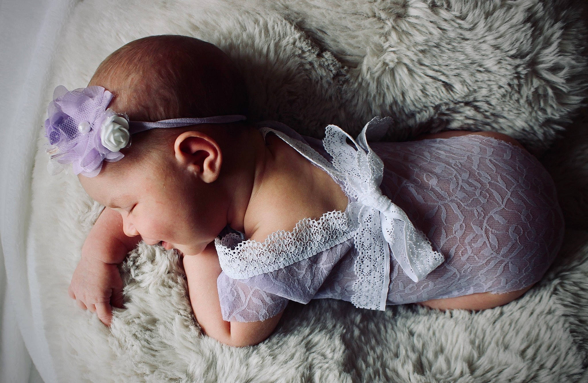 Keira is registered to the contest to win money with this photo: baby, baby_toddler_clothing, cap, dress, ear, embellishment, fawn, grey, happy, headband, headgear, headpiece, linens, person, petal, pink, skin, sleeve, textile, toddler