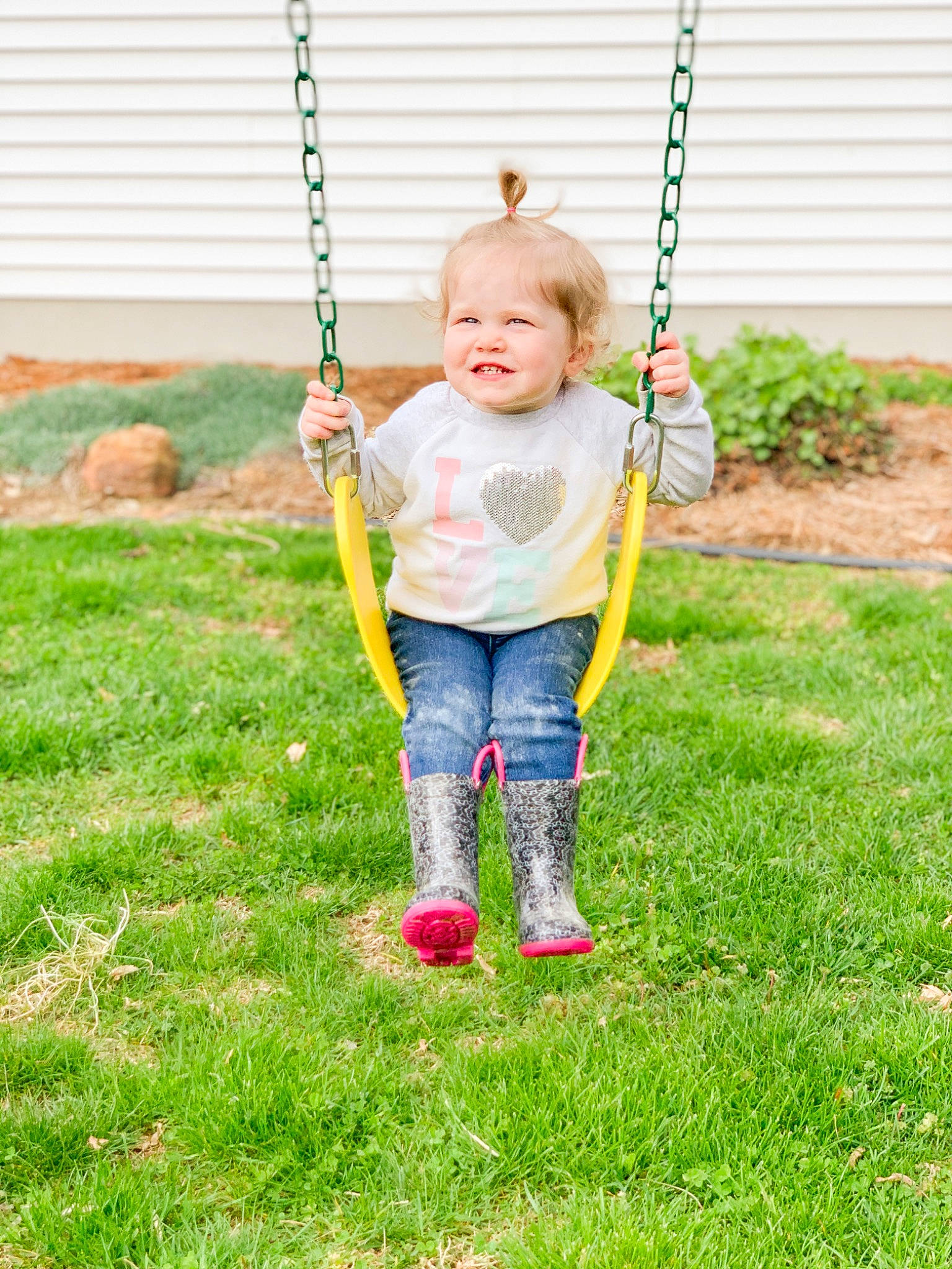 Hartley joined the competition — help win amazing prizes! child, grass, joy, outdoor_play_equipment, person, play, recreation, swing, toddler