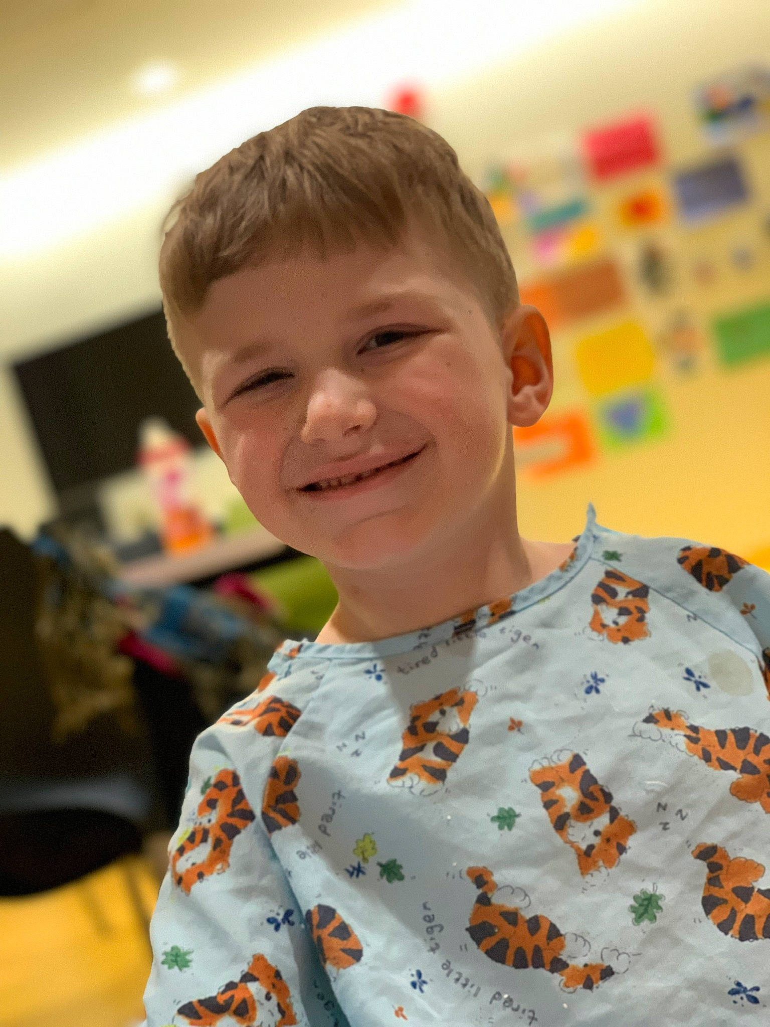 Liam is registered to the contest to win money with this photo: child, face, hair, joy, person, smile, t_shirt, toddler