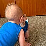 Cylas joined the competition — help win amazing prizes! baby, baby_toddler, blue_shirt, carpet, child, crawling, curious, floor, furniture, hand, indoor, mirror, portrait, reflection, reflection_in_mirror, room, short_hair, skin, toddler, wooden_cabinet