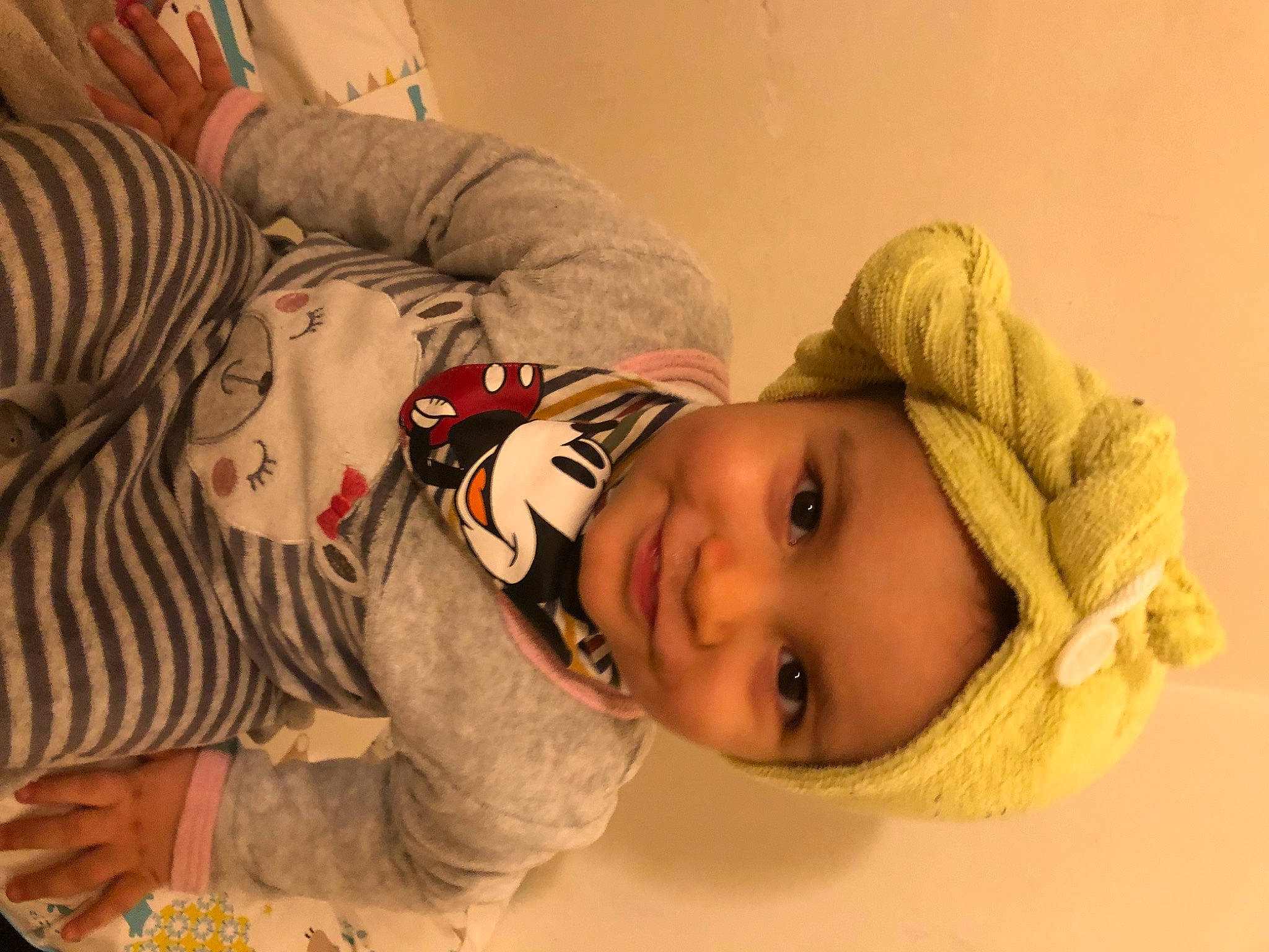 Nayla participe au concours pour gagner de l'argent avec cette photo : baby, cheek, child, comfort, eyelash, fun, fur, happy, hat, headwear, joy, lip, mouth, nose, person, portrait_photography, room, skin, sleeve, smile