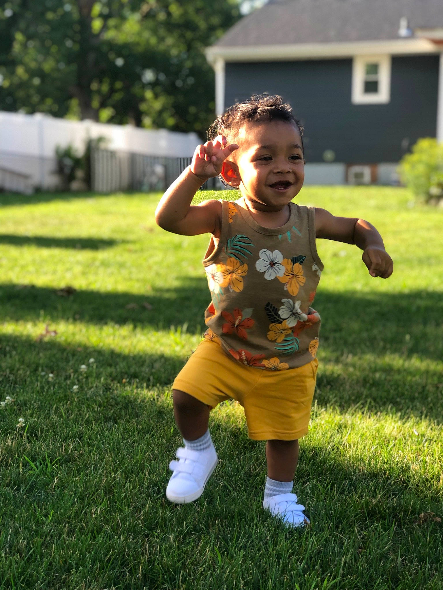 Zoriel is registered to the contest to win money with this photo: baby_toddler_clothing, ball, child, fun, garden, grass, grass_family, grassland, happy, joy, lawn, leisure, meadow, people_in_nature, person, plant, recreation, shorts, smile, t_shirt