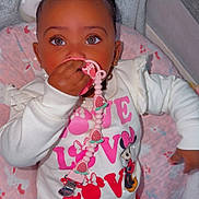 Harmony joined the competition — help win amazing prizes! toddler, baby, child, pacifier, clothing, red_pants, white_sweater, minnie_mouse, indoor, blanket, cute, portrait, face, hand, headwear, earrings, pink, toy, baby_crib, happy