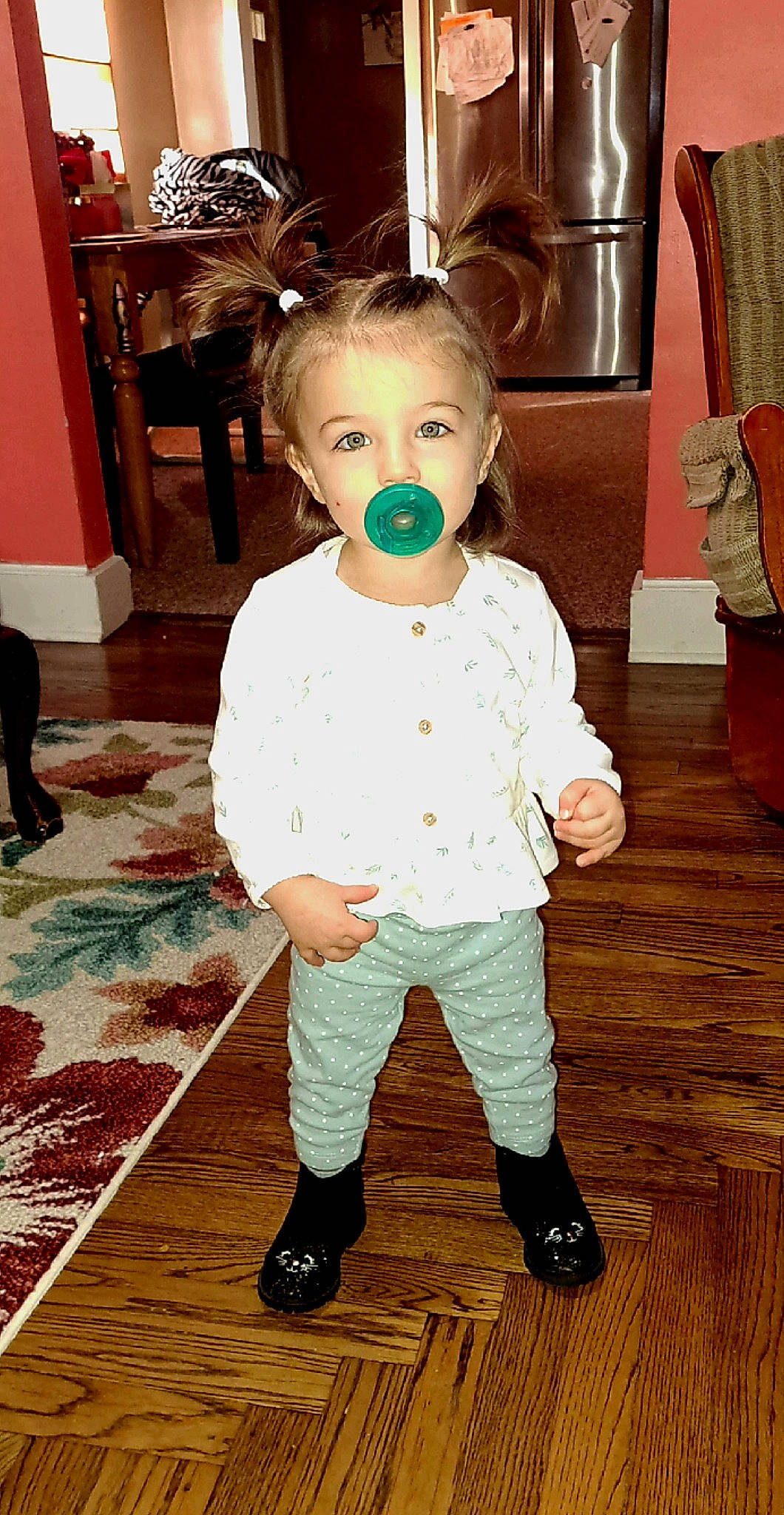 Ivy is registered to the contest to win money with this photo: baby, baby_toddler_clothing, cheek, child, costume, flooring, formal_wear, fun, fur, happy, hardwood, pattern, person, room, sitting, sleeve, standing, toddler, toy, wood