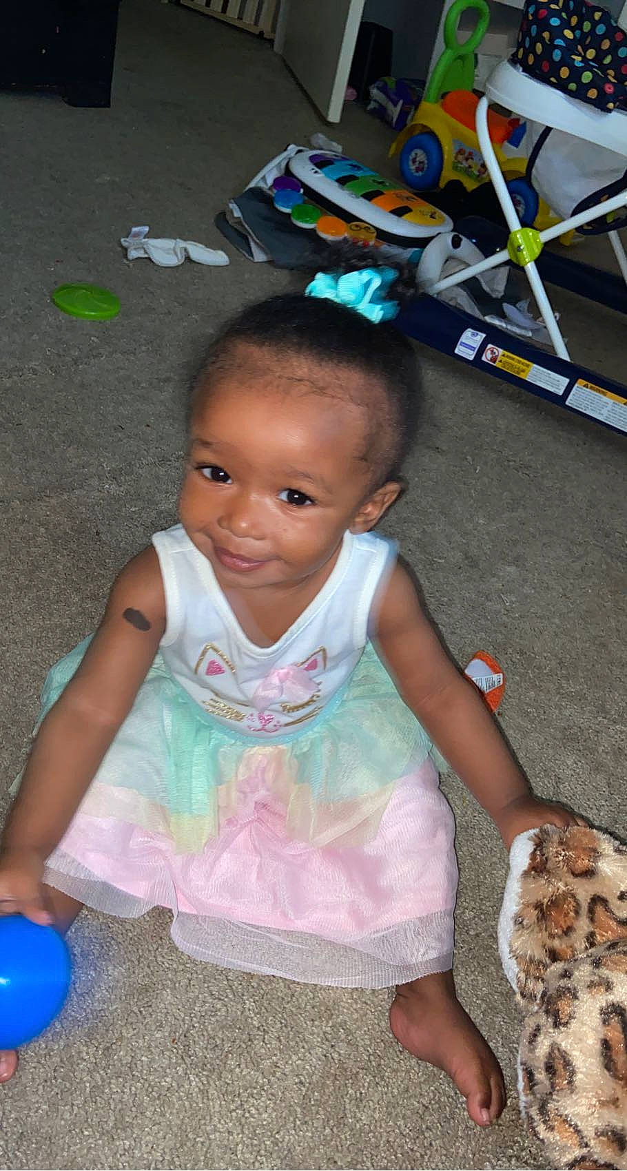 Nylei is registered to the contest to win money with this photo: adaptation, baby, baby_toddler_clothing, balloon, blue, child, event, fun, hairstyle, happy, head, joy, leisure, person, pink, public_space, sitting, skin, smile, toddler