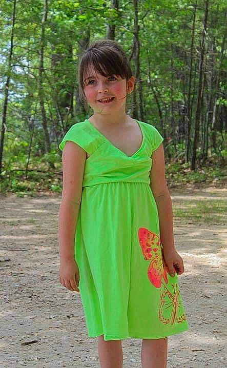 Ashlyn joined the competition — help win amazing prizes! brown_hair, day_dress, dress, formal_wear, fun, grass, hair, happy, joy, long_hair, magenta, one_piece_garment, pattern, people_in_nature, person, plant, shoulder, sleeve, smile, tree