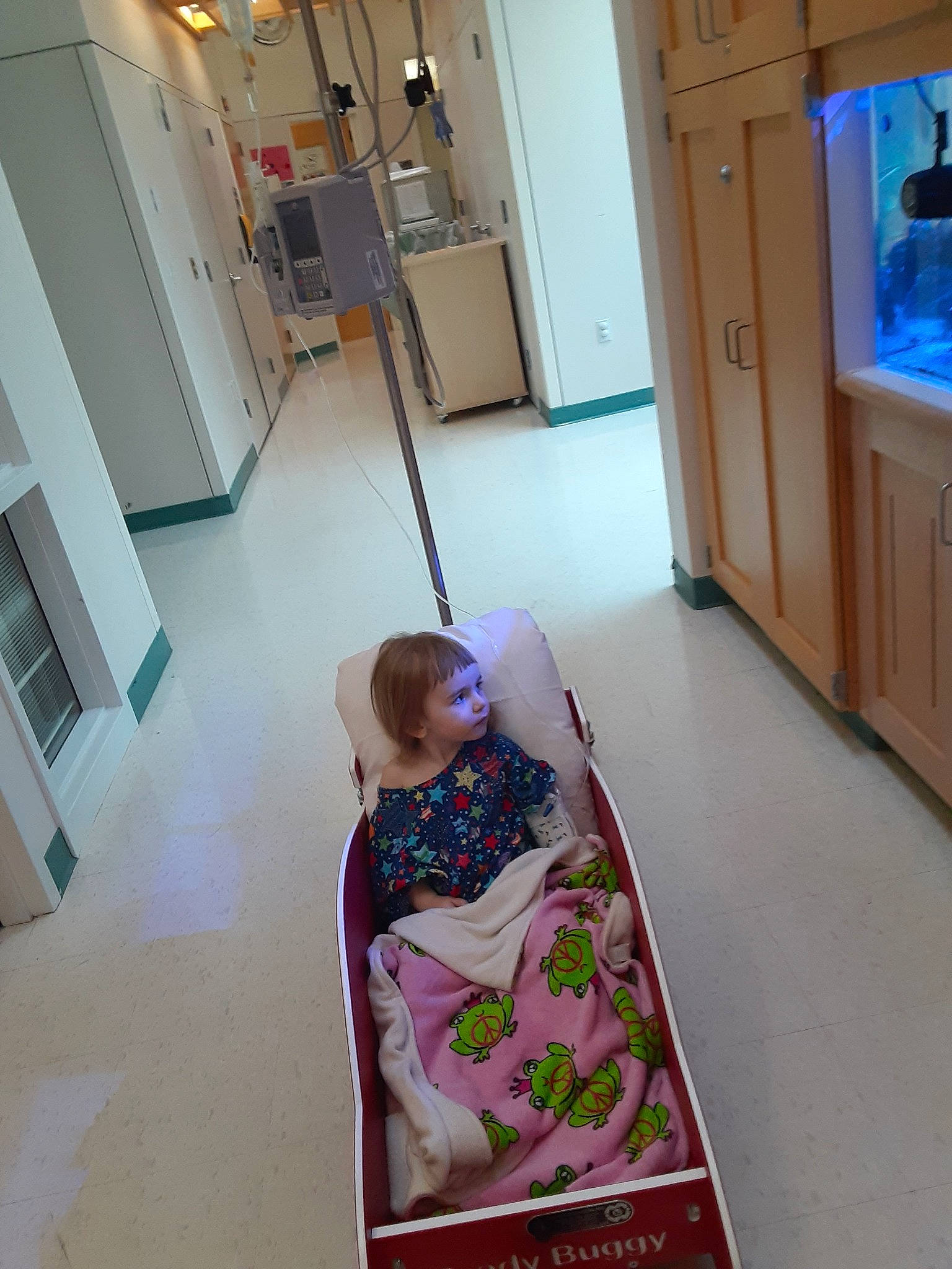 Violet is registered to the contest to win money with this photo: child, floor, flooring, person, room, toddler