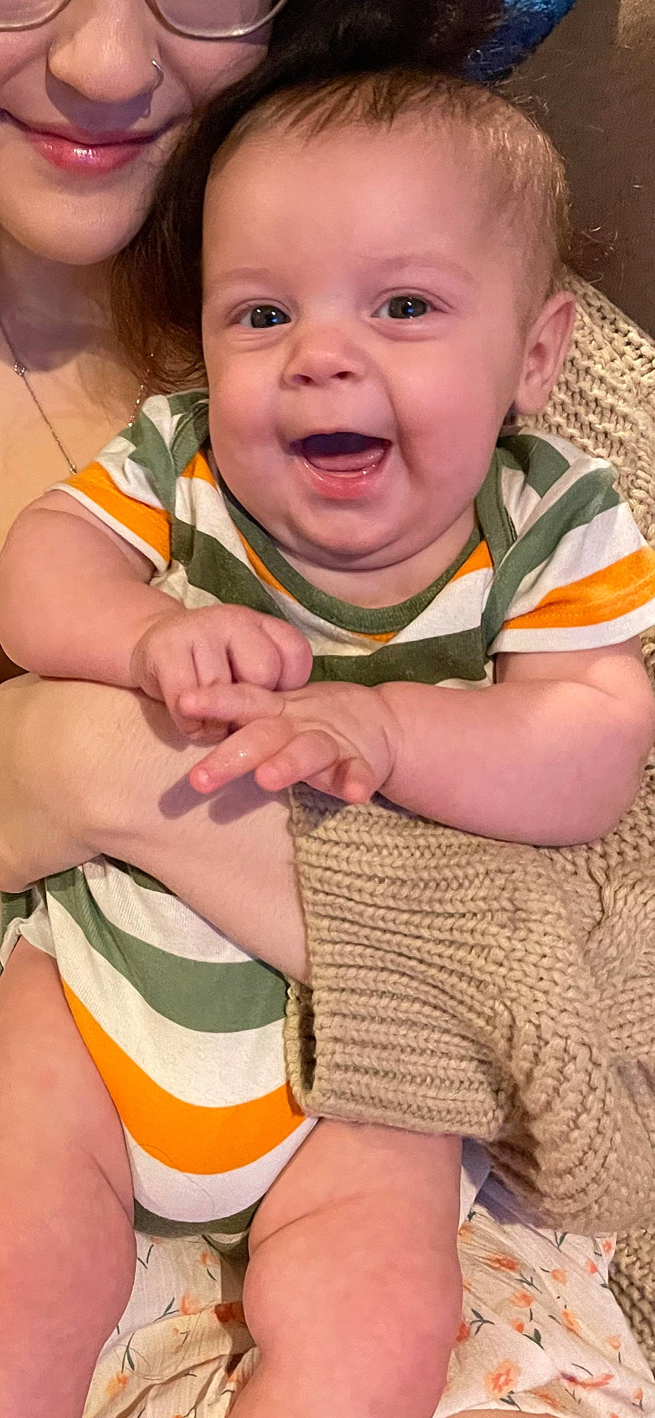 Callahan is registered to the contest to win money with this photo: baby, baby_toddler_clothing, cheek, comfort, finger, fun, gesture, green, happy, iris, nose, organ, people, person, pink, skin, sleeve, smile, thigh, thumb