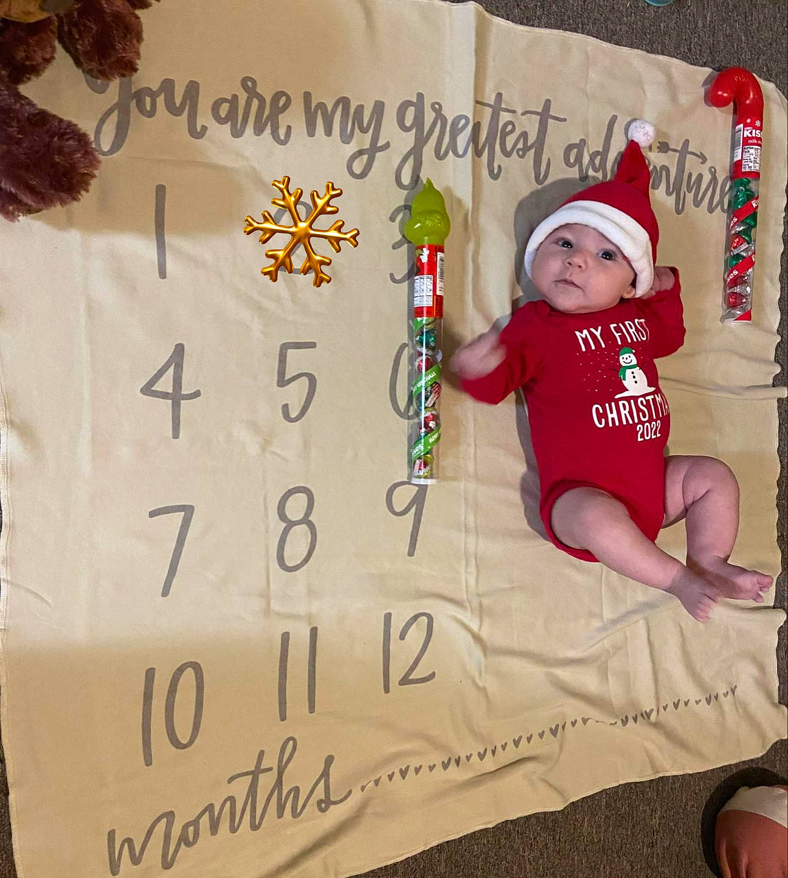 Griffin joined the competition — help win amazing prizes! baby, baby_toddler_clothing, carmine, child, comfort, event, fictional_character, font, happy, hat, headwear, holiday, linens, pattern, person, room, sleeve, sock, t_shirt, textile