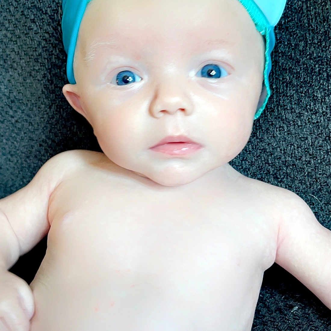 Kelton is registered to the contest to win money with this photo: baby, baby_toddler_clothing, blue, cap, cheek, child, costume_hat, eye, eyebrow, eyelash, face, happy, head, headgear, jewellery, lip, neck, skin, toddler, white