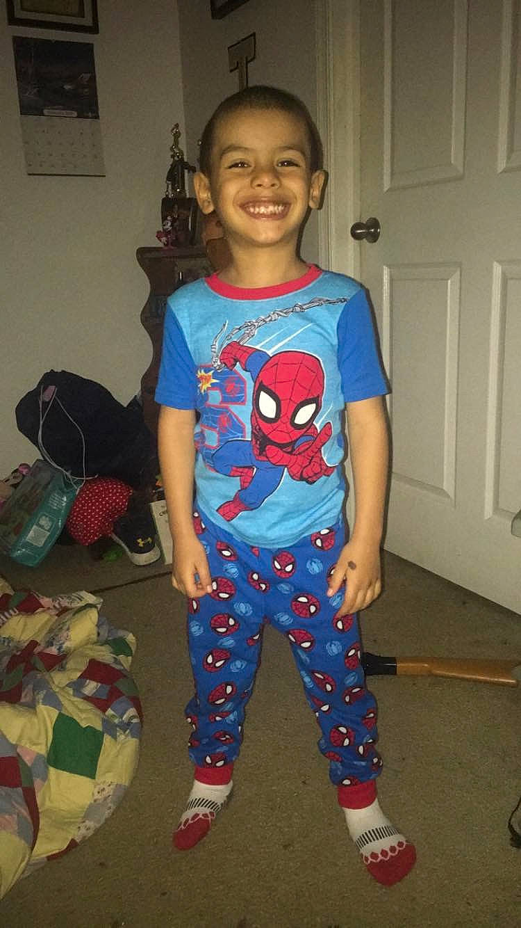 Amani joined the competition — help win amazing prizes! blue, child, clothing, costume, fictional_character, joy, pajamas, person, sleeve, smile, t_shirt, toddler