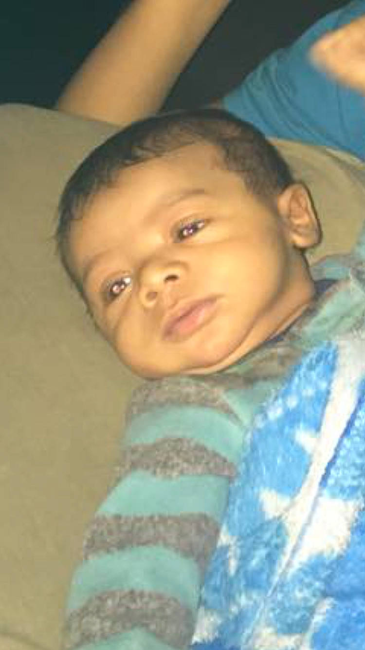 Amani is registered to the contest to win money with this photo: baby, cheek, child, chin, cool, eye, eyebrow, face, forehead, fun, head, human, iris, lip, male, mouth, nose, person, skin, smile