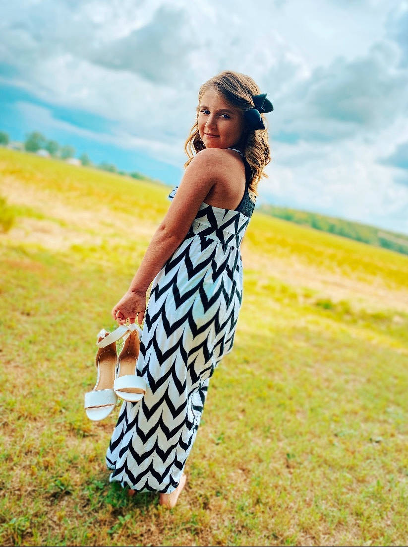 Karlee is registered to the contest to win money with this photo: cloud, day_dress, dress, electric_blue, fashion_design, flash_photography, grass, grass_family, grassland, happy, human_leg, joy, landscape, long_hair, meadow, people_in_nature, person, prairie, sky, street_fashion