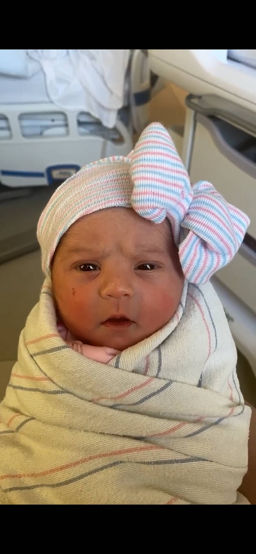 Fay is registered to the contest to win money with this photo: baby, baby_toddler_clothing, cap, cheek, chin, comfort, cool, eyebrow, face, forehead, fun, headgear, headwear, linens, lip, mouth, nose, person, skin, sleeve