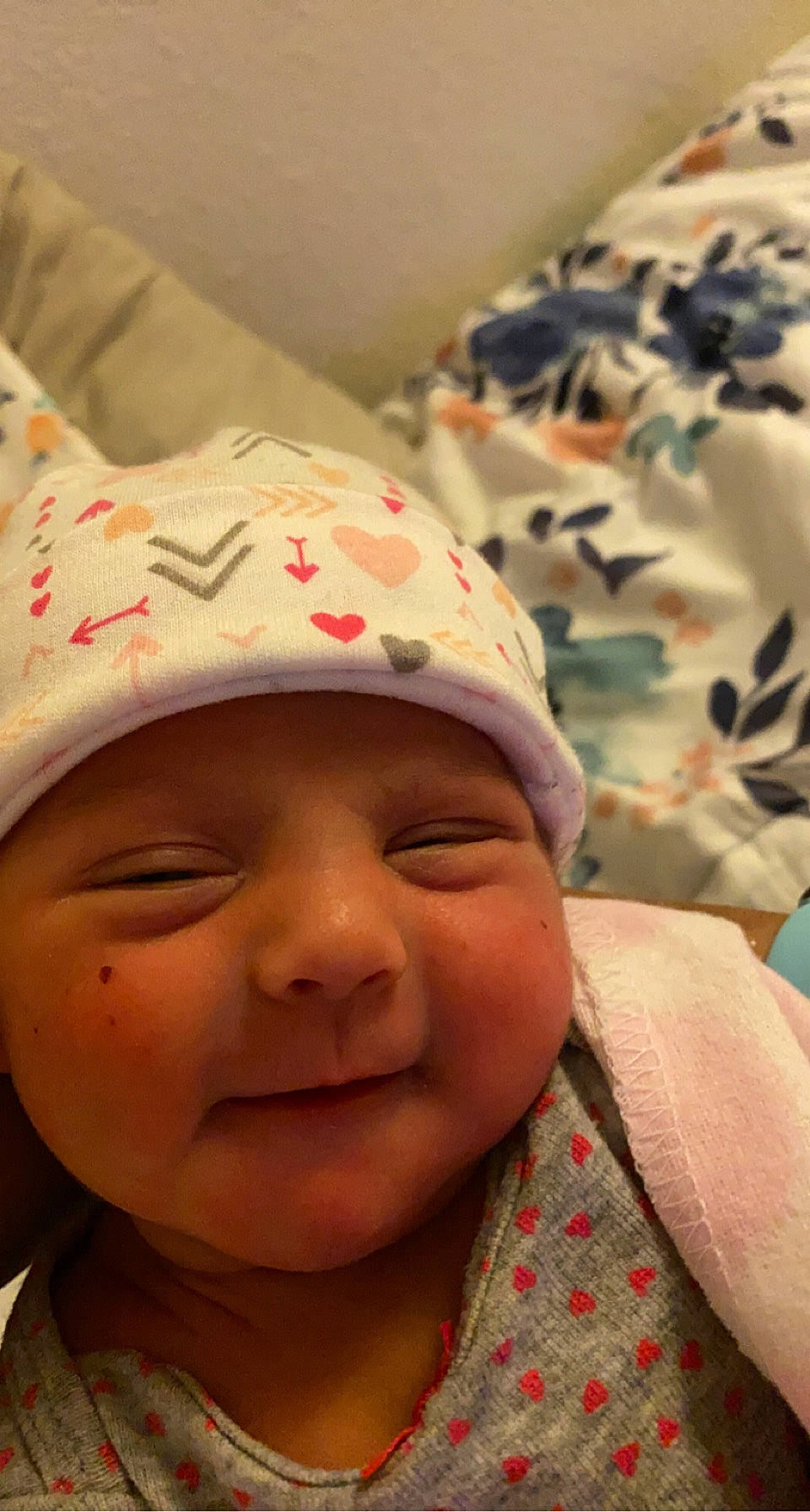 Fay is registered to the contest to win money with this photo: baby, baby_laughing, cap, cheek, child, chin, face, facial_expression, fun, happy, headgear, headwear, leisure, lip, mouth, nose, person, pink, skin, smile