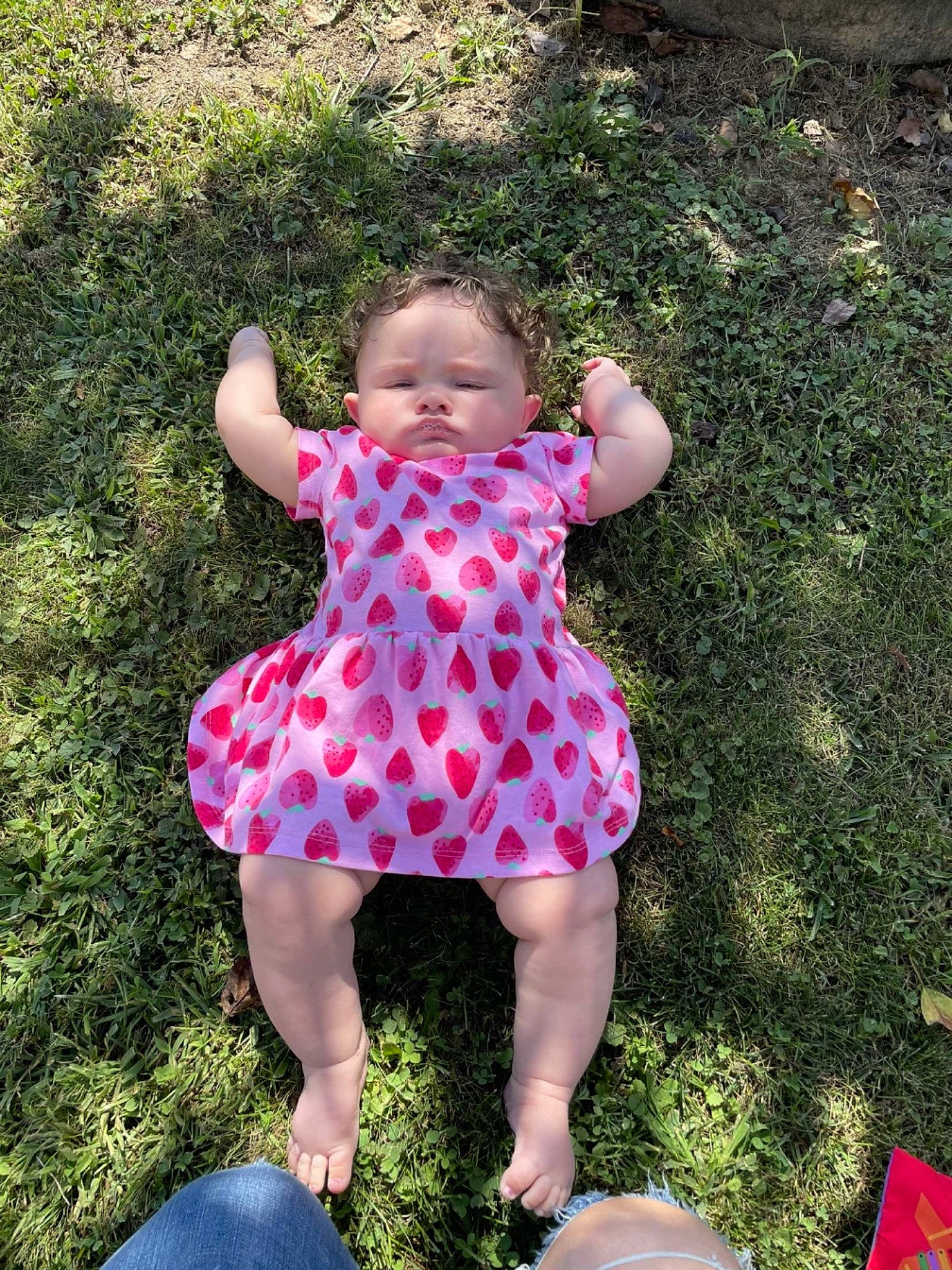 Essence is registered to the contest to win money with this photo: baby_toddler_clothing, beauty, botany, dress, fun, grass, grass_family, happy, lawn, leaf, magenta, meadow, nature, pattern, people_in_nature, person, photograph, pink, plant, sleeve