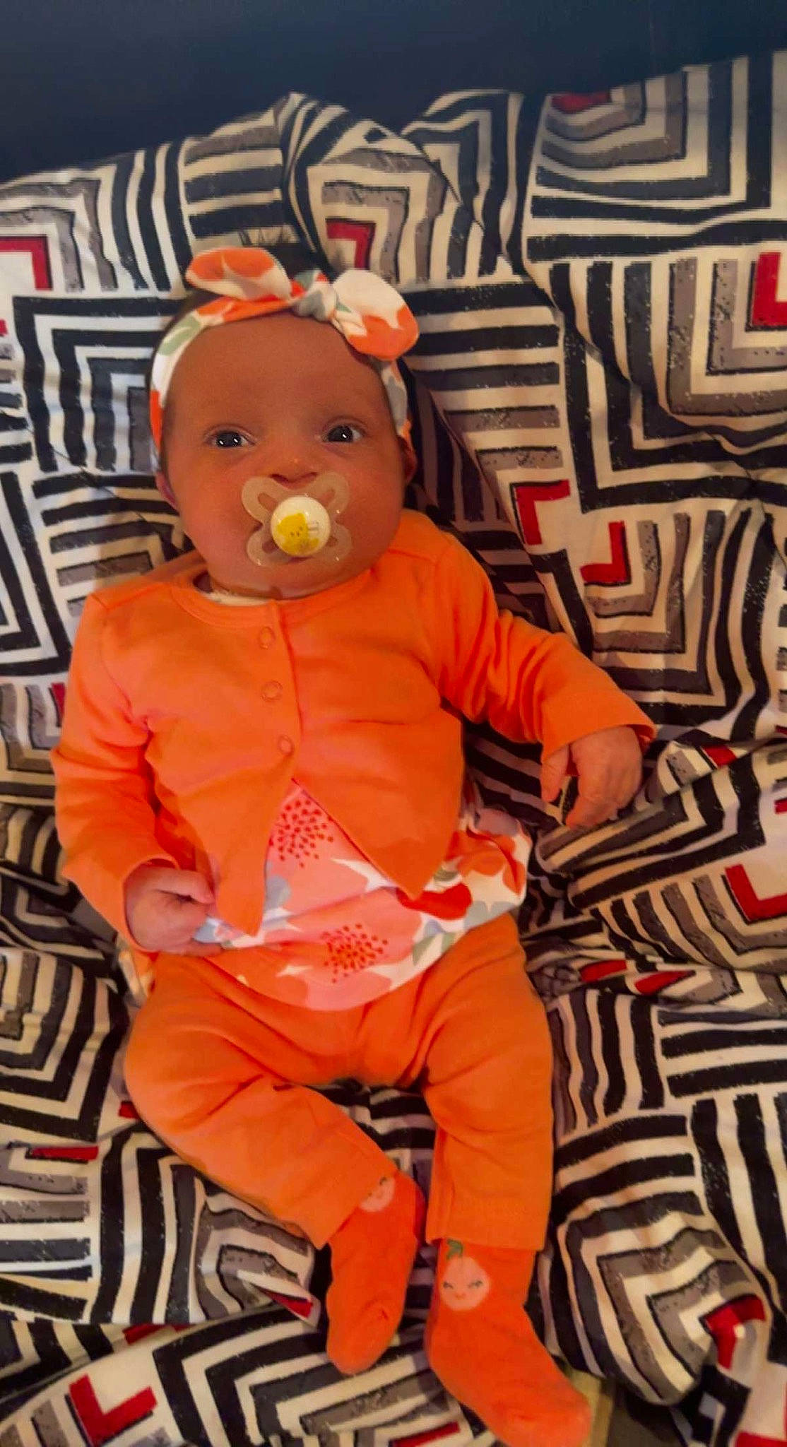 Leilani is registered to the contest to win money with this photo: art, baby, baby_toddler_clothing, child, costume, flooring, fun, fur, happy, orange, peach, person, pink, product, room, sitting, stuffed_toy, textile, toddler, toy