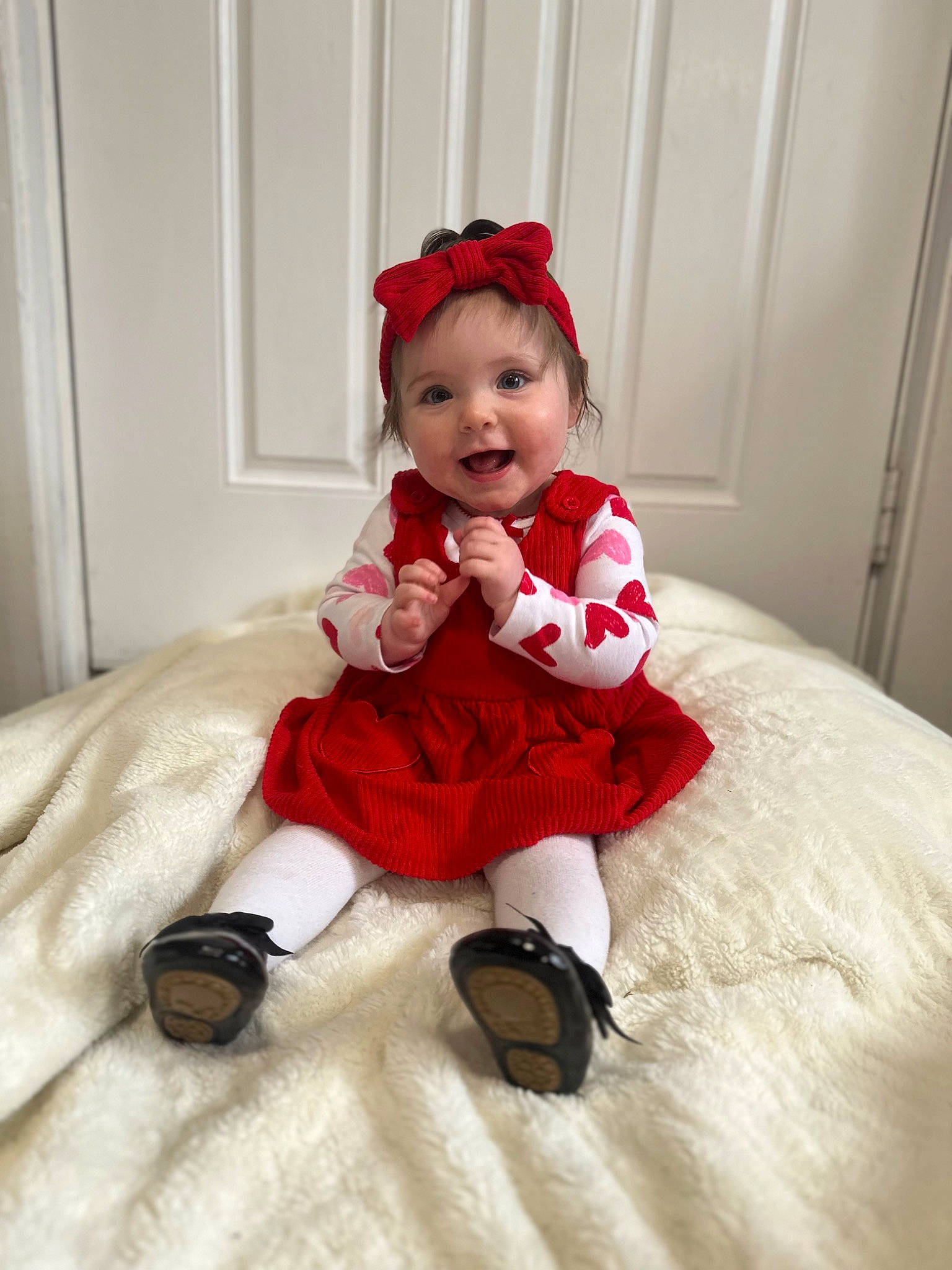 Oakleigh joined the competition — help win amazing prizes! baby_toddler_clothing, comfort, costume_hat, door, dress, embellishment, event, fur, hat, headpiece, headwear, human_body, human_leg, joy, magenta, pattern, person, pink, sitting, sleeve