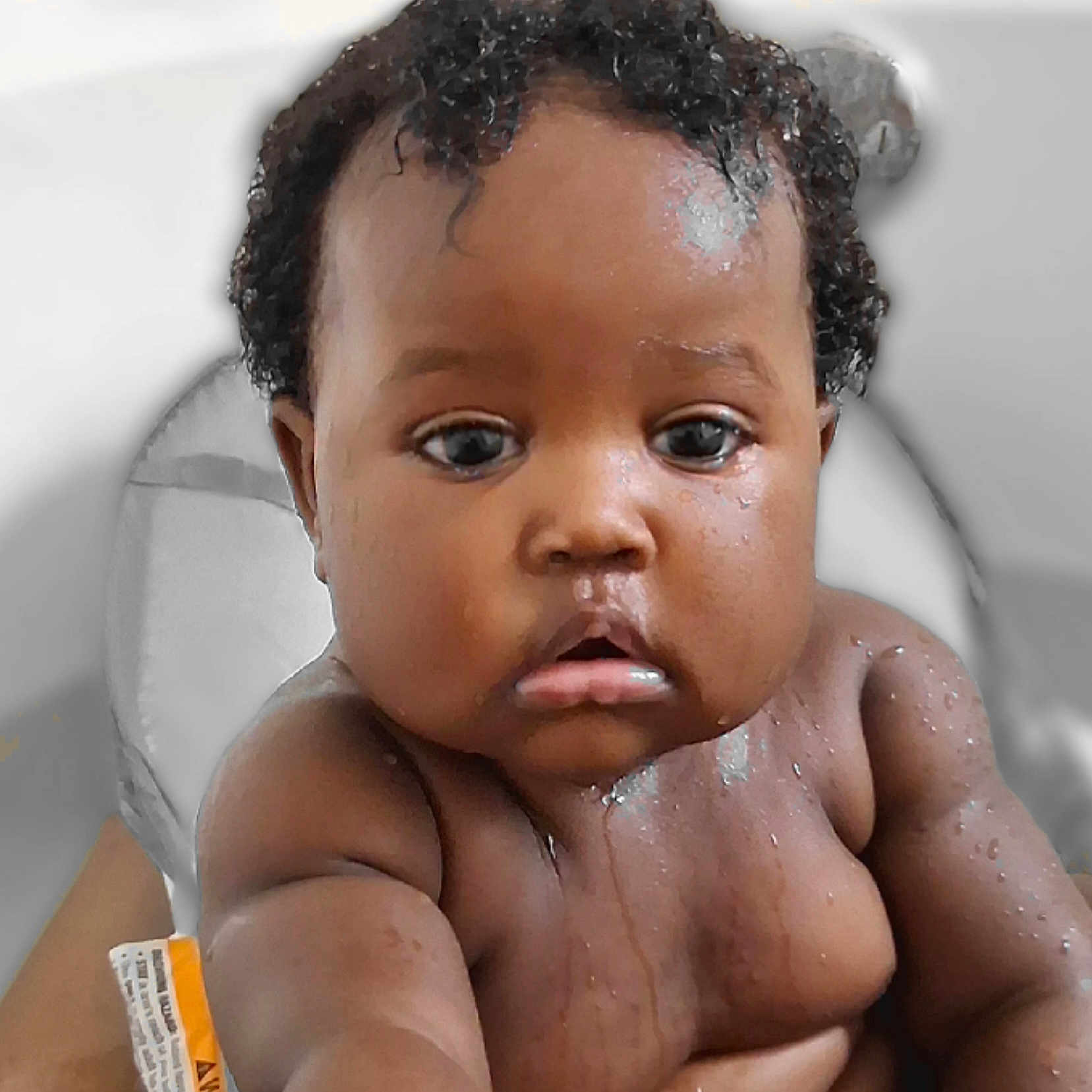 Myla joined the competition — help win amazing prizes! adorable, baby, child, chubby_cheeks, close_up, curly_hair, cute, expression, eyes, face, human, indoors, infant, looking, person, portrait, skin, water_drops, wet_skin, young_child