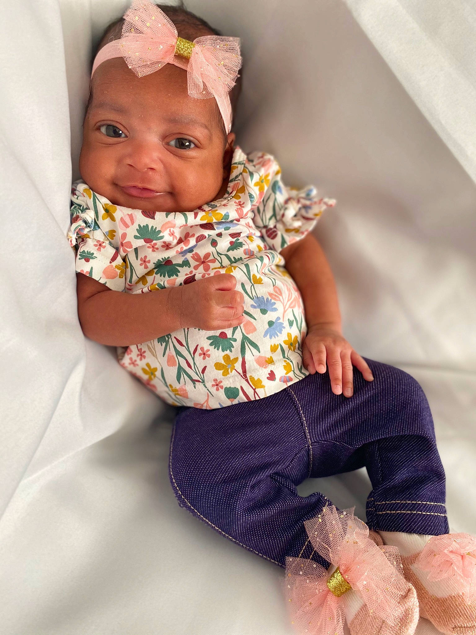 Kaylanie joined the competition — help win amazing prizes! baby, baby_toddler_clothing, beauty, child, comfort, event, finger, hand, headwear, human, knee, linens, neck, pattern, person, pink, skin, sleeve, sock, textile