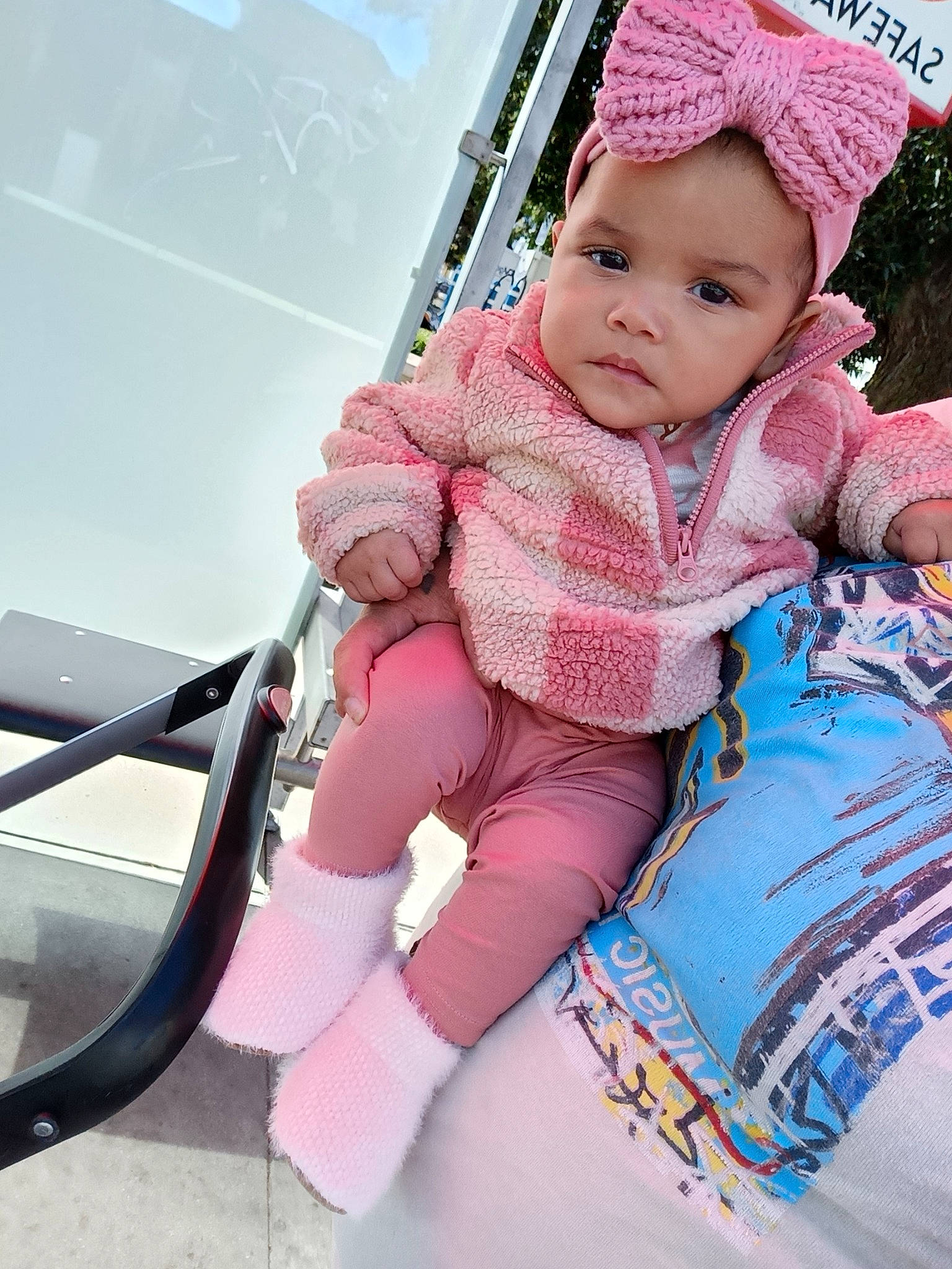 Anabella is registered to the contest to win money with this photo: baby, baby_toddler_clothing, cap, child, comfort, fun, happy, headwear, human_body, knit_cap, leisure, magenta, person, pink, recreation, skin, sleeve, steering_wheel, toddler, vehicle_door
