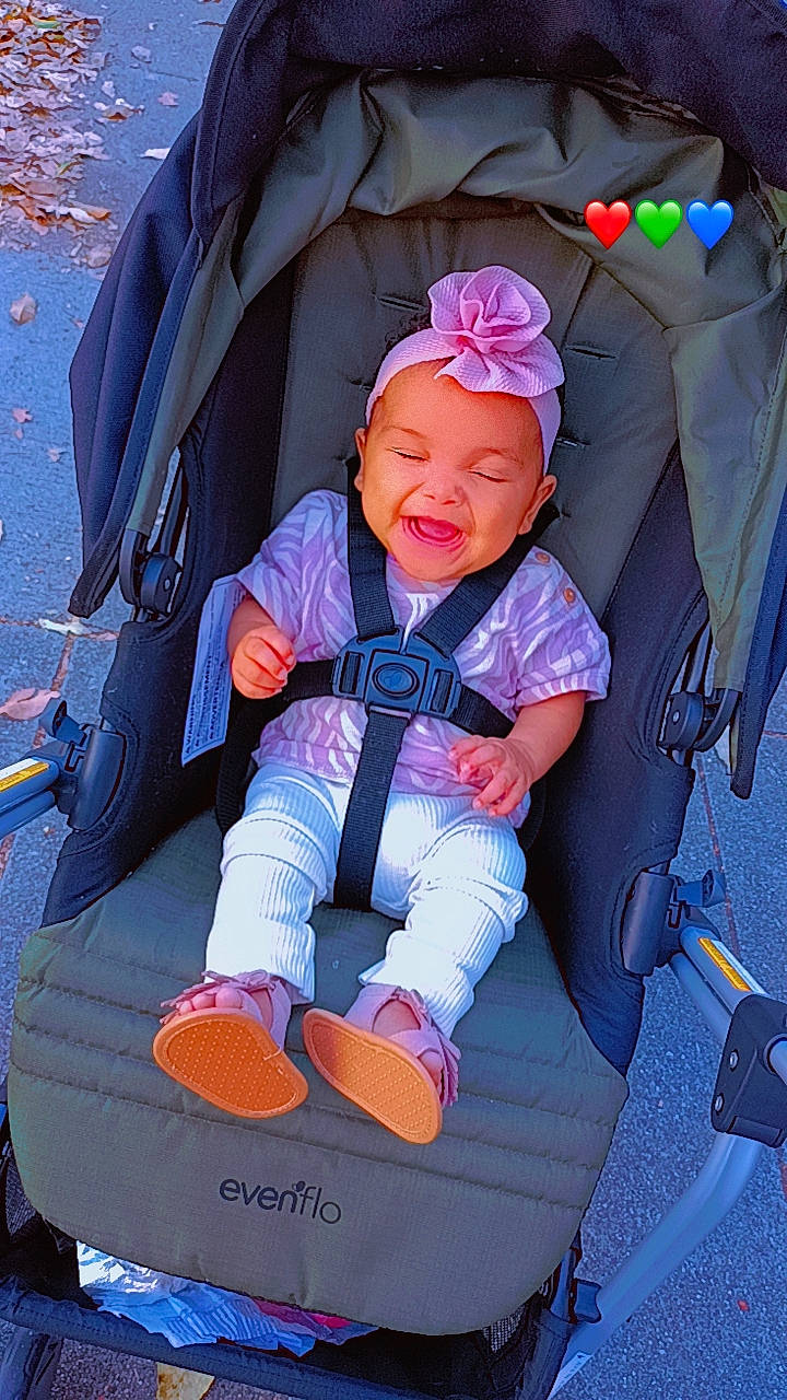 Anabella joined the competition — help win amazing prizes! baby, baby_carriage, baby_products, baby_toddler_clothing, bag, child, comfort, electric_blue, fun, hat, lap, leisure, magenta, person, pink, purple, sitting, smile, toddler, travel