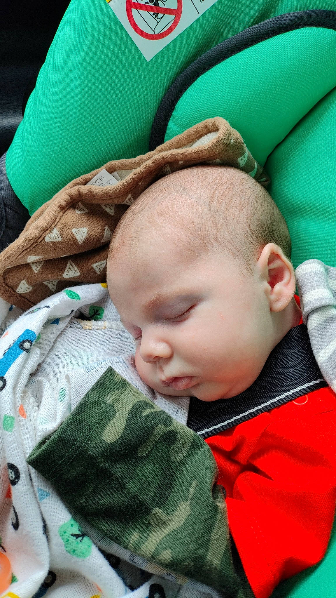 Dean joined the competition — help win amazing prizes! baby, baby_carriage, baby_products, baby_toddler_clothing, cheek, child, comfort, grass, green, happy, linens, pattern, person, sitting, skin, sleeve, toddler