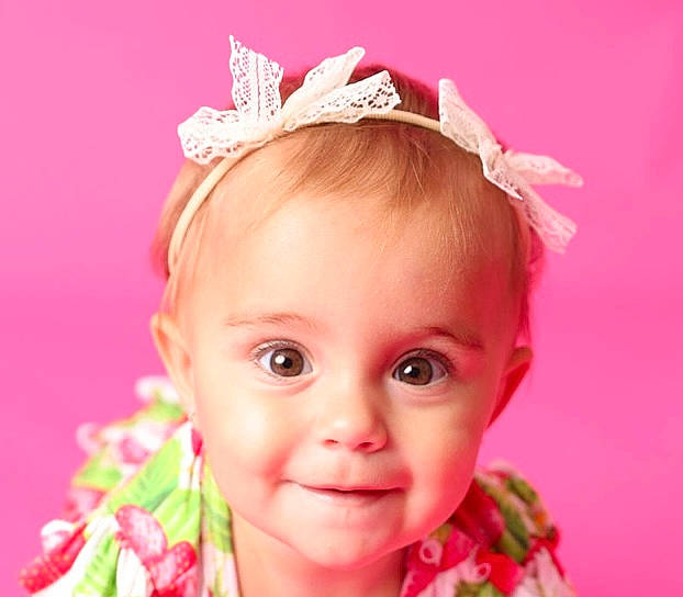 Rhapsody joined the competition — help win amazing prizes! baby, baby_toddler_clothing, cheek, eyebrow, eyelash, facial_expression, flower, hairstyle, happy, head, headgear, headpiece, iris, joy, lip, magenta, person, petal, pink, skin