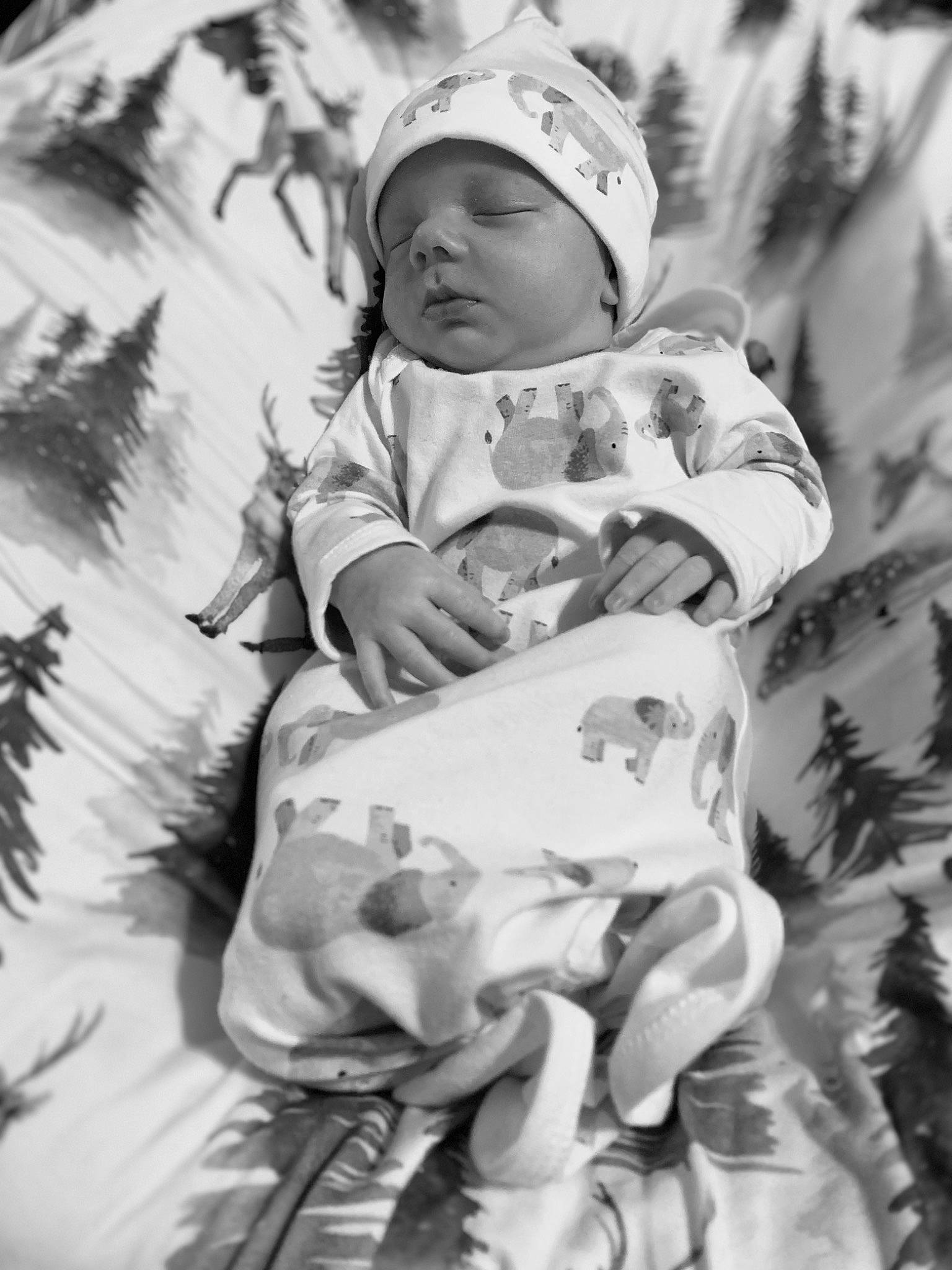 Parker joined the competition — help win amazing prizes! baby, baby_products, baby_toddler_clothing, black_and_white, cap, child, comfort, fun, gesture, grass, happy, headwear, monochrome, monochrome_photography, pattern, people_in_nature, person, portrait_photography, sitting, stock_photography