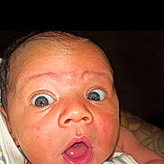 Kross joined the competition — help win amazing prizes! baby, face, wide_eyes, surprised, mouth_open, skin, infant, portrait, close_up, expression, newborn, person, child, human, cute, stripes, cloth, wrapped, head, background