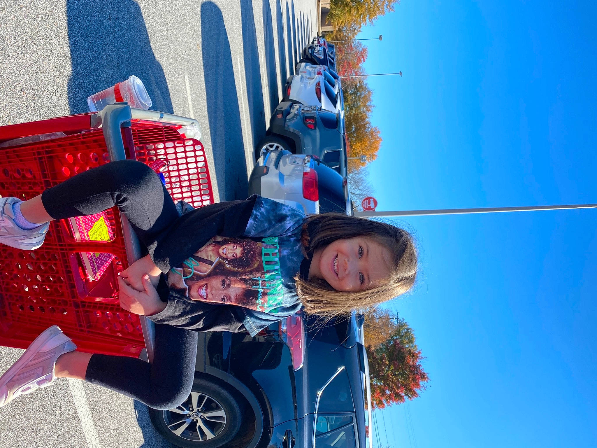 Katalina is registered to the contest to win money with this photo: automotive_design, automotive_exterior, automotive_lighting, automotive_tire, azure, blue, car, electric_blue, fun, joy, leisure, motor_vehicle, person, plant, sky, smile, tire, travel, tree, vehicle