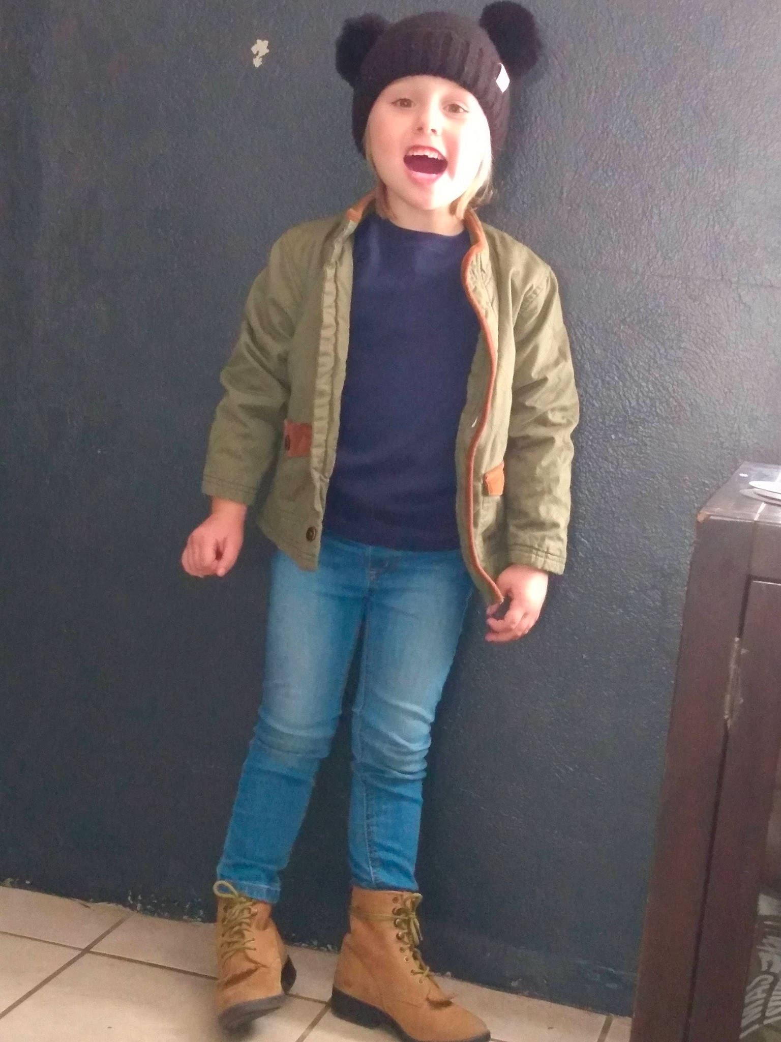 Laylah is registered to the contest to win money with this photo: blazer, cap, denim, electric_blue, fashion_accessory, fashion_design, flash_photography, fur, headgear, headwear, human_leg, jeans, joint, knee, person, shoe, sleeve, sneakers, t_shirt, waist