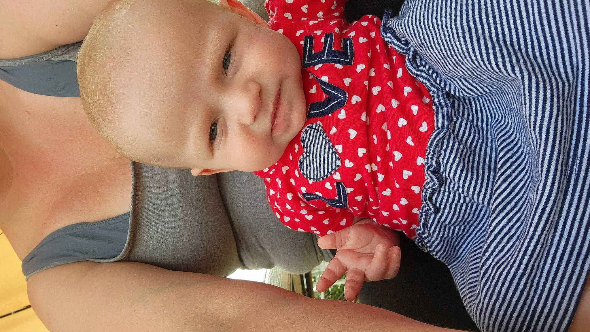 Kenslee is registered to the contest to win money with this photo: baby, baby_toddler_clothing, chest, child, comfort, elbow, finger, gesture, hand, happy, human_body, knee, pattern, person, plaid, skin, sleeve, smile, thigh, toddler