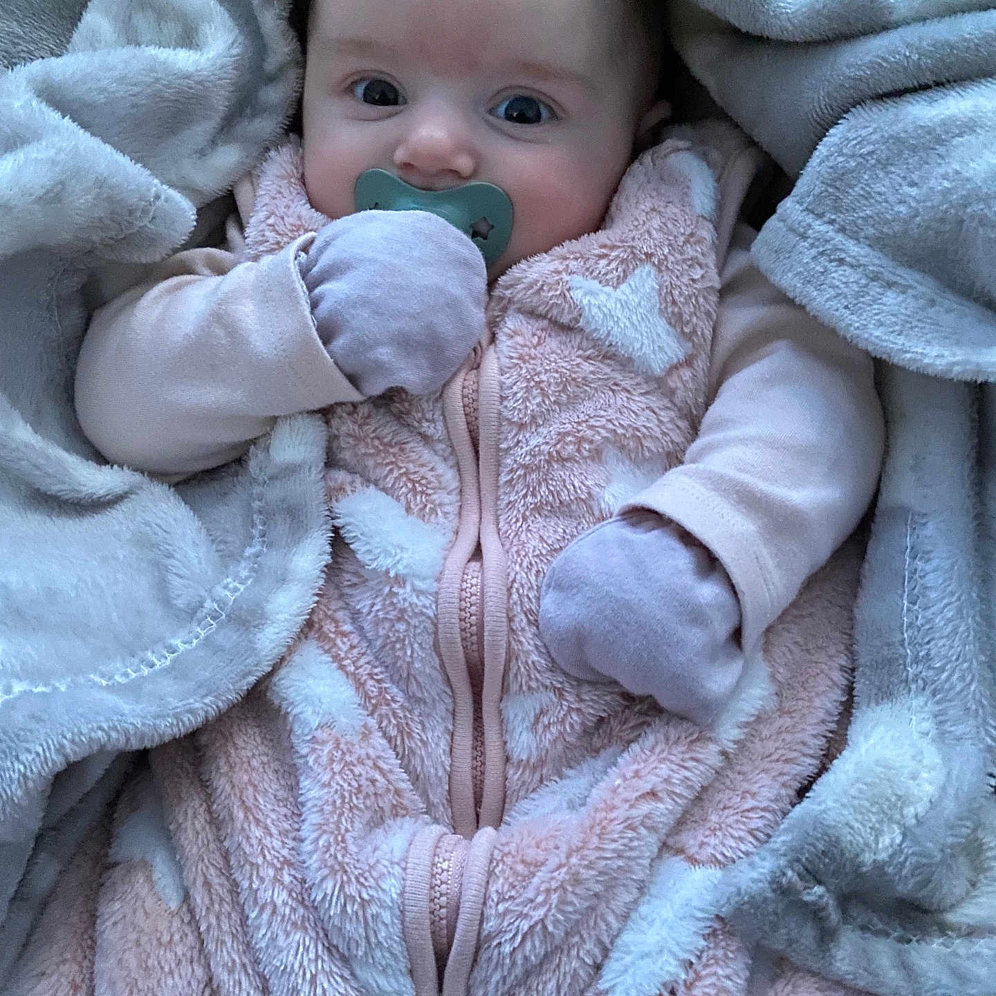 Aniya joined the competition — help win amazing prizes! baby, blanket, bonnet, clothing, coat, face, happy, hat, head, hood, jacket, knitwear, newborn, person, photography, portrait, quilt, smile, sweater, towel