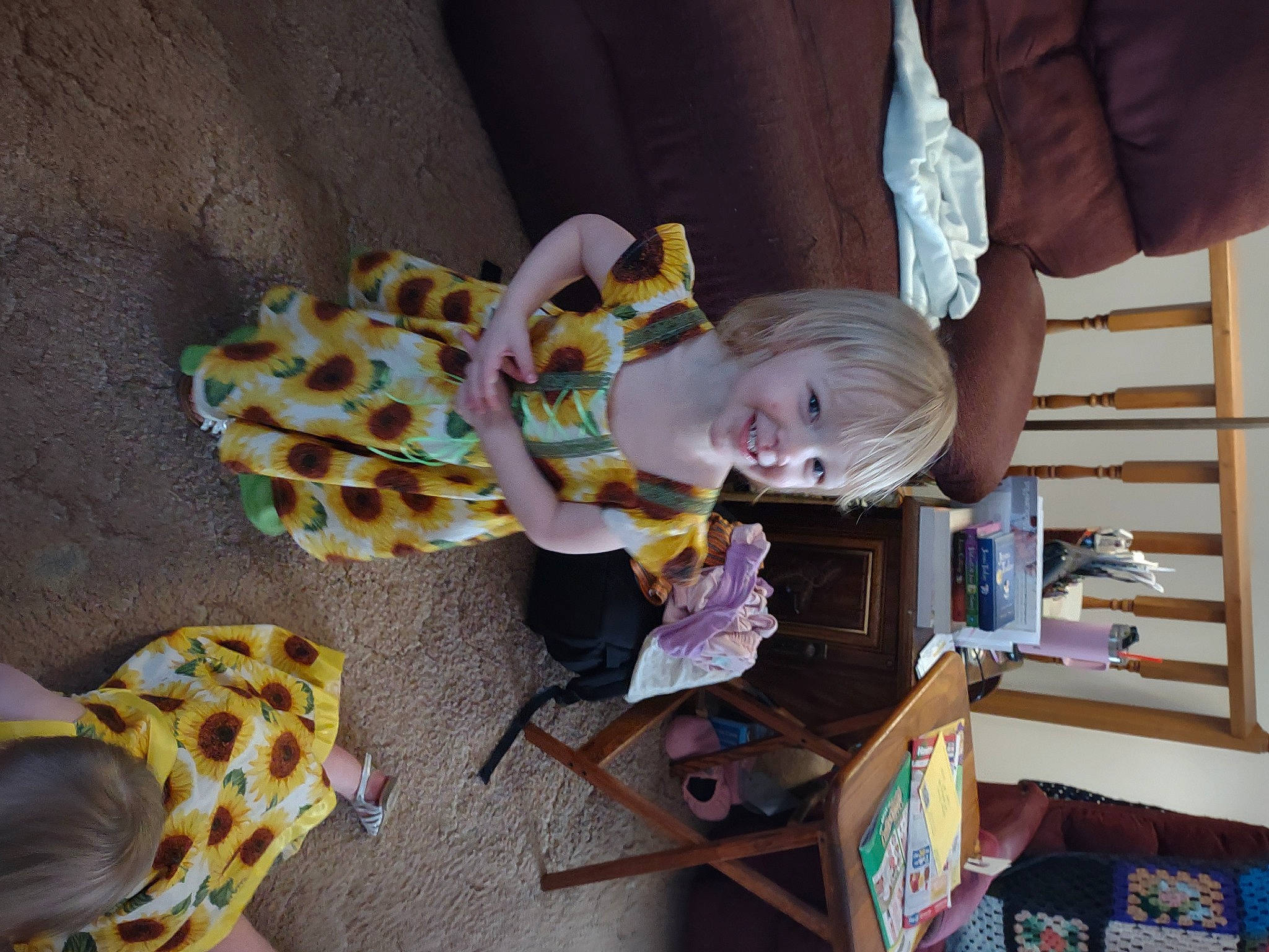 Alice is registered to the contest to win money with this photo: baby, baby_products, baby_toddler_clothing, baby_toys, child, desk, fun, giraffe, hat, joy, pattern, person, play, room, smile, stuffed_toy, table, toddler, toy, wood