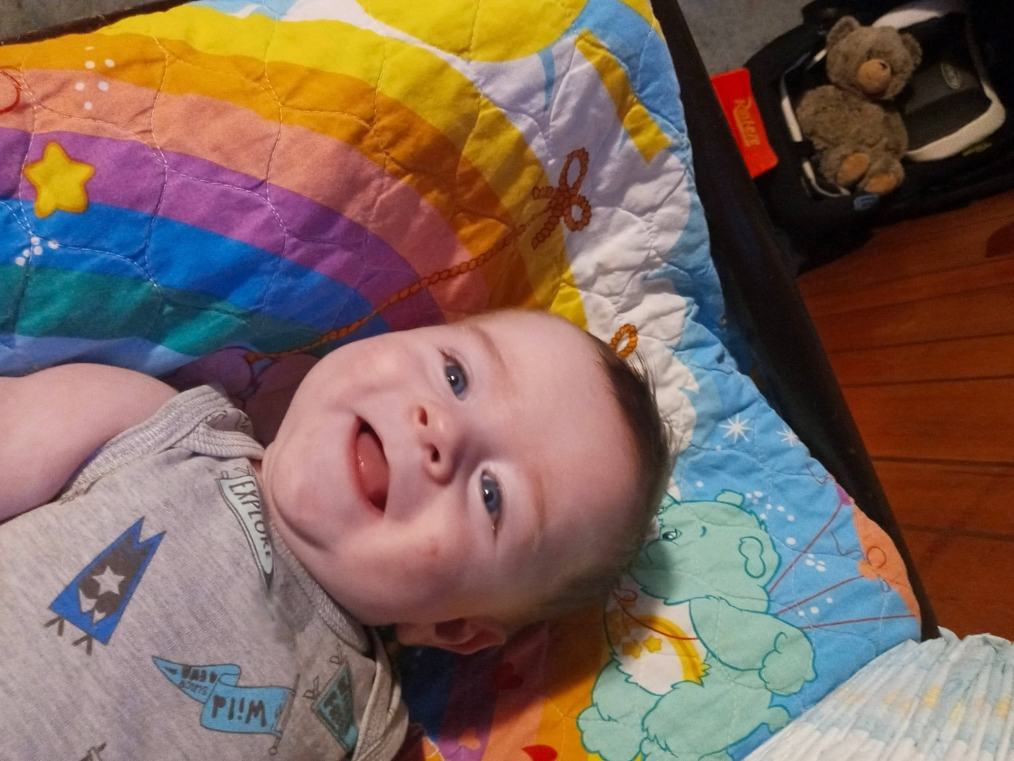 Dennis is registered to the contest to win money with this photo: baby, baby_toddler_clothing, cheek, child, comfort, fun, grass, happy, iris, leisure, linens, nose, orange, pattern, person, skin, smile, textile, toddler, tree