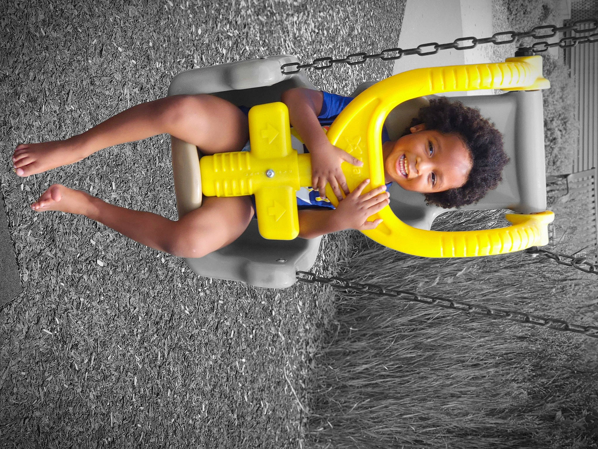 Jerry Jr is registered to the contest to win money with this photo: child, elbow, flash_photography, flooring, font, fun, gesture, grass, happy, human_leg, knee, leisure, person, recreation, smile, t_shirt, thigh, toddler, wrist