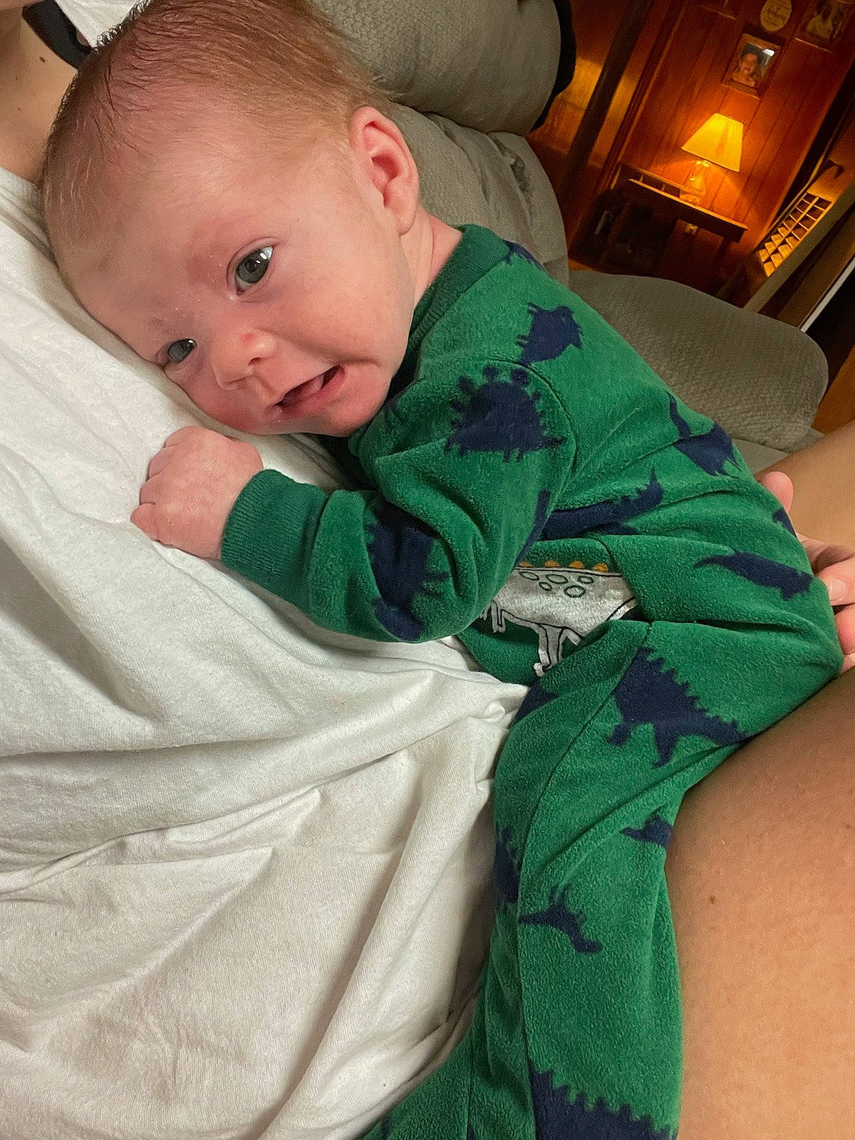 Clayton is registered to the contest to win money with this photo: baby, baby_products, baby_toddler_clothing, chair, cheek, child, comfort, couch, elbow, fun, grass, hairstyle, iris, linens, person, room, sitting, skin, sleeve, t_shirt