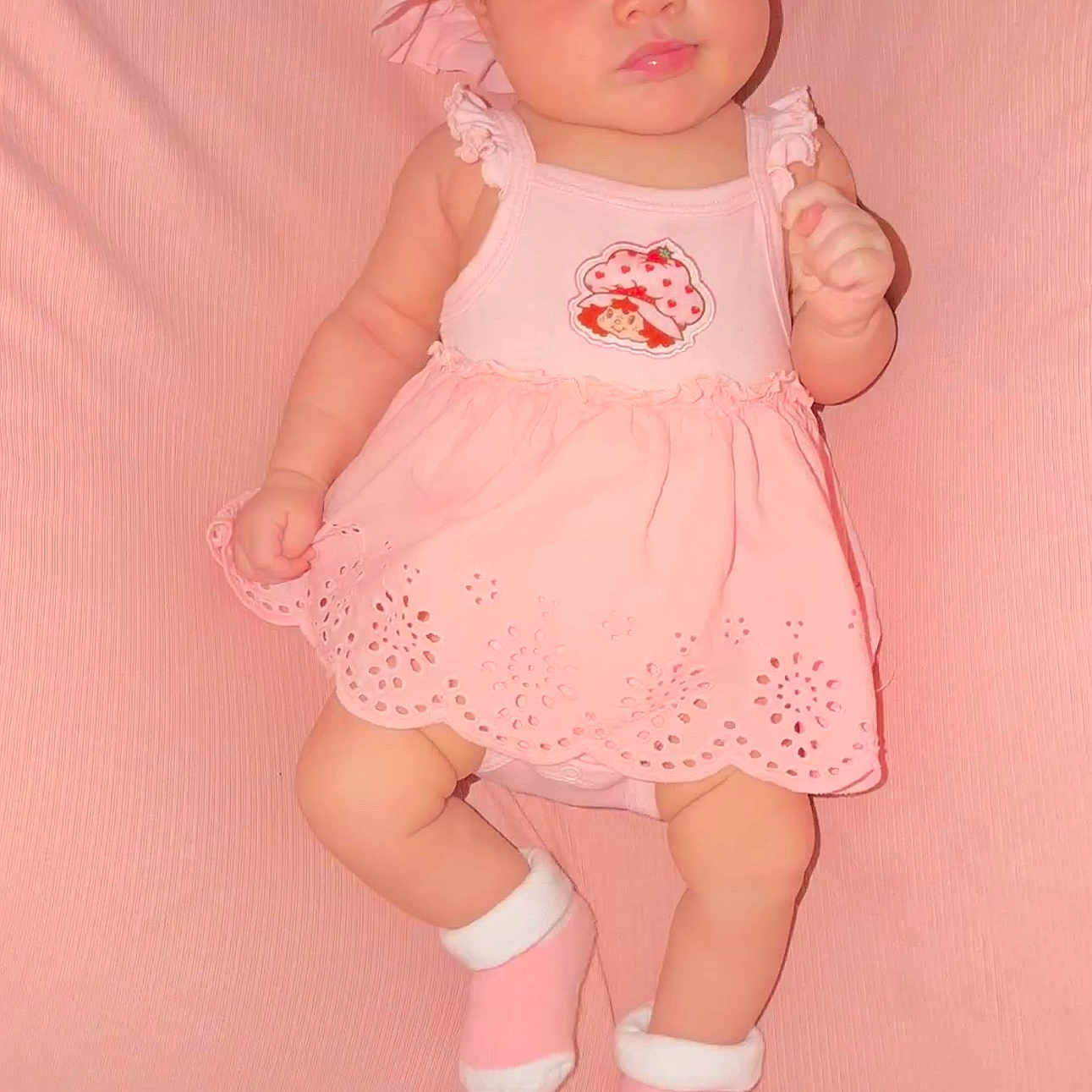 Valentina is registered to the contest to win money with this photo: adorable, baby, child, clothing, cute, dress, face, fashion, hands, hat, indoors, infant, legs, pink, portrait, skin, smile, socks, soft_background, studio