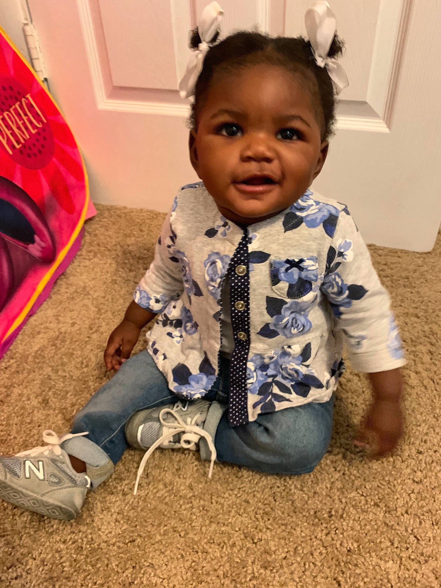 Kassidy is registered to the contest to win money with this photo: adaptation, baby, cheek, child, cool, face, footwear, fun, hairstyle, happy, head, outerwear, person, play, shoe, sitting, skin, smile, t_shirt, toddler