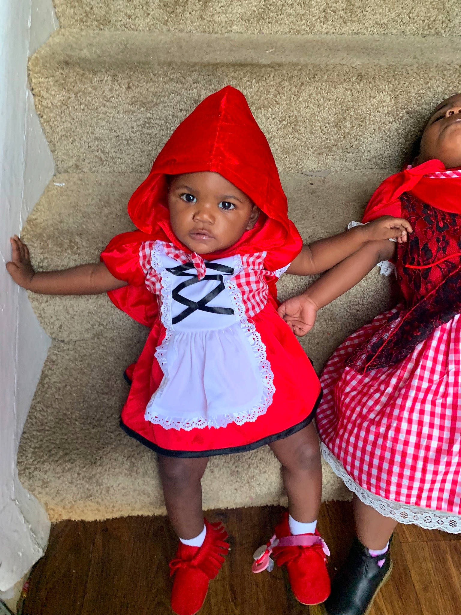 Kassidy is registered to the contest to win money with this photo: child, child_model, christmas_eve, clothing, costume, fictional_character, person, pink, red, toddler